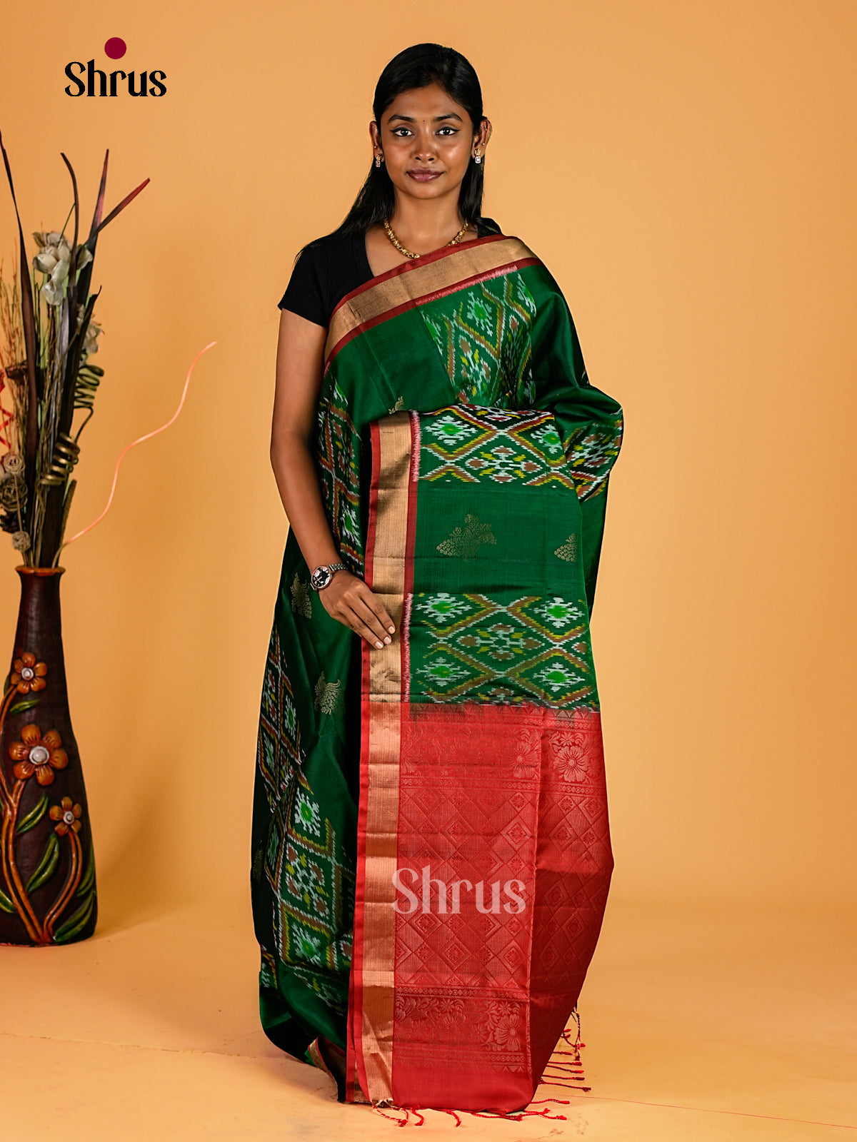 Splendid Bottle Green Soft Silk Sarees With Ikat Motifs, Peacock Buttas & Crimson Red Kaddi Zari Border