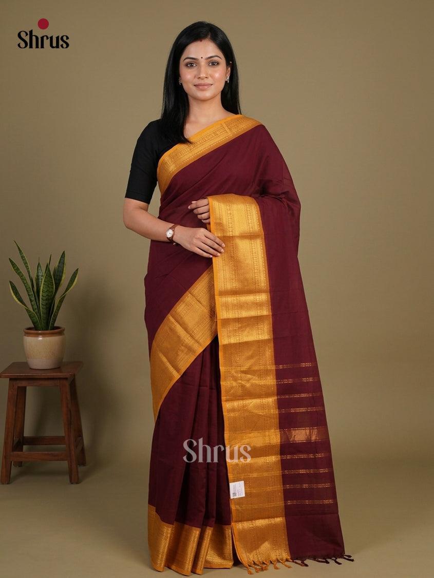 Striking Deep Maroon Chettinad Cotton Saree With Plain Body & Golden Yellow Zari Border