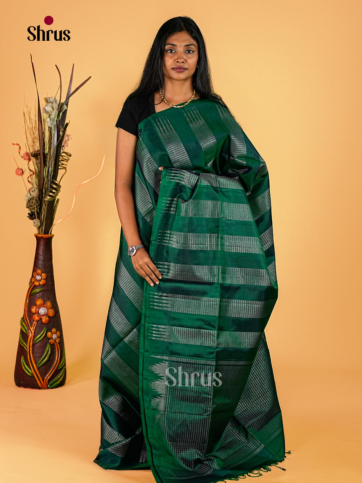Striking Emerald Green Soft Silk Sarees with Silver Zari Striped Bands & Self Brocade Pallu With Temple Patterns