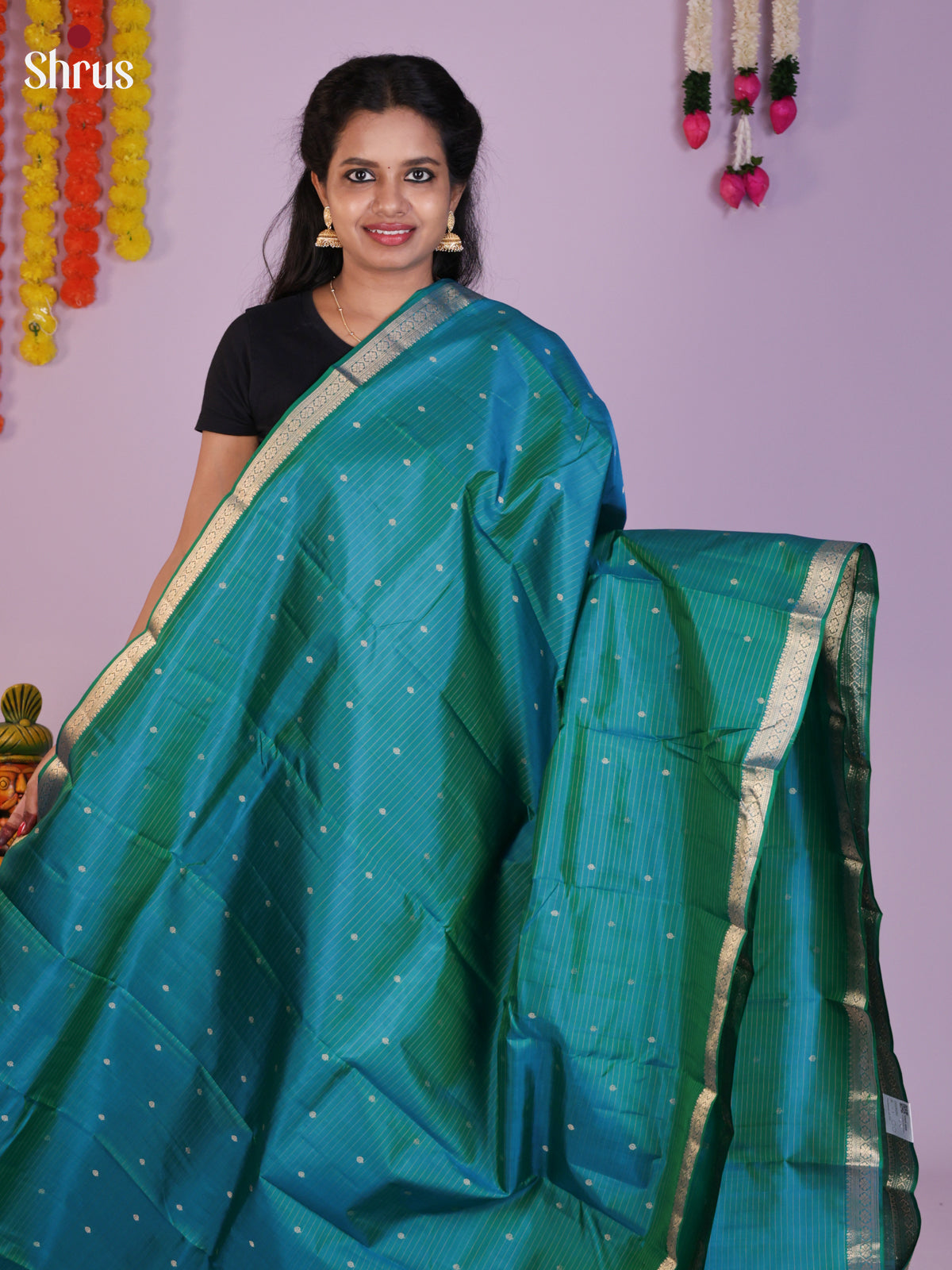 Buy Shimmery Teal Blue Kanchipuram Sarees with Fine Zari Stripes, Small Buttas & Brocade Pallu