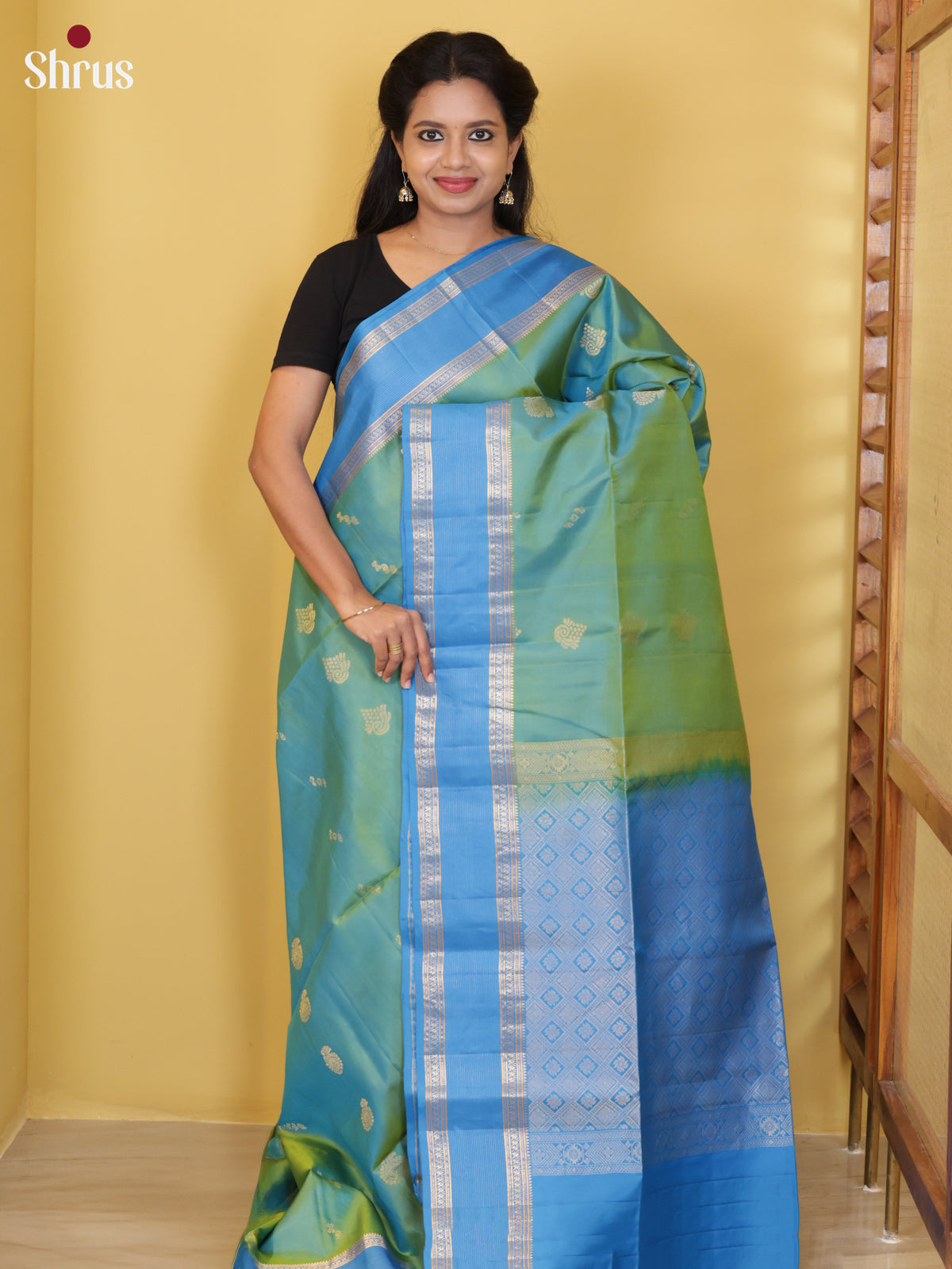 Buy Majestic Teal Green Soft Silk Saree with Zari Floral Buttas, Sky Blue Rettapet Border & Pallu