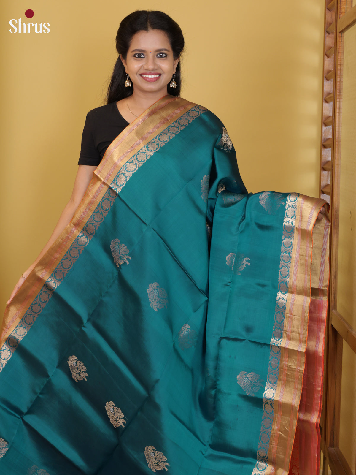 Buy Exquisite Teal Pure Soft Silk Saree with Floral Motifs, Zari Border & Orangish Pink Pallu