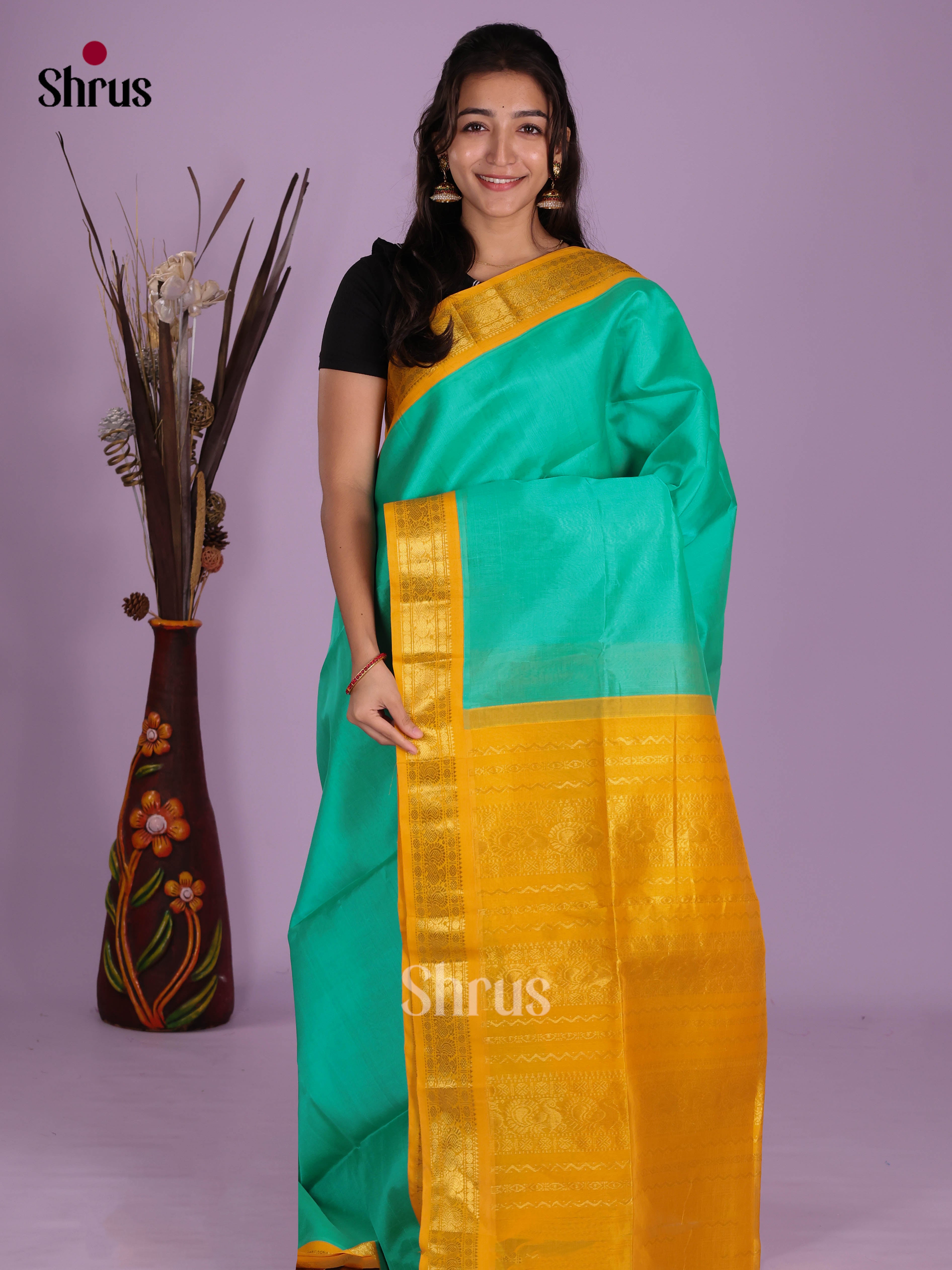 Buy Pretty Teal Silk Cotton Saree with Plain Body, Mustard Yellow Traditional Zari Border & Pallu
