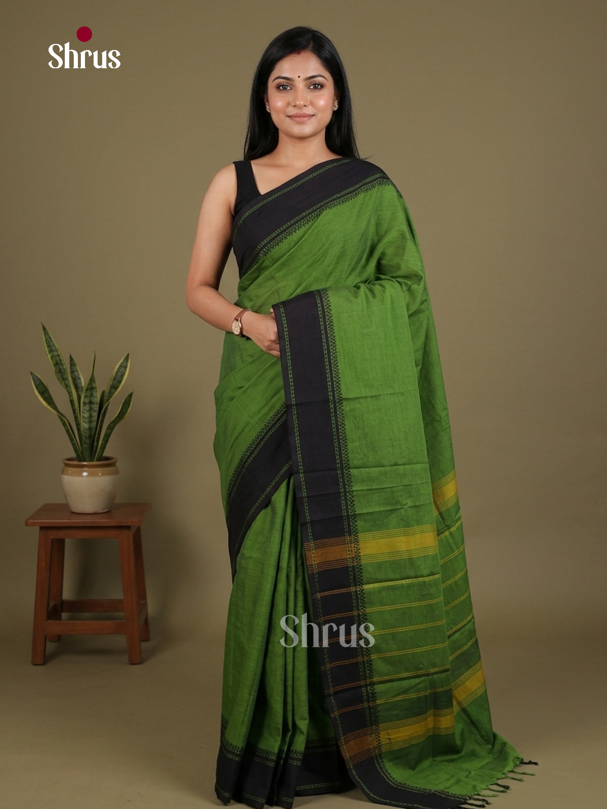 Timeless Green Chettinad Cotton Saree With Plain Body & Black Thread Woven Border