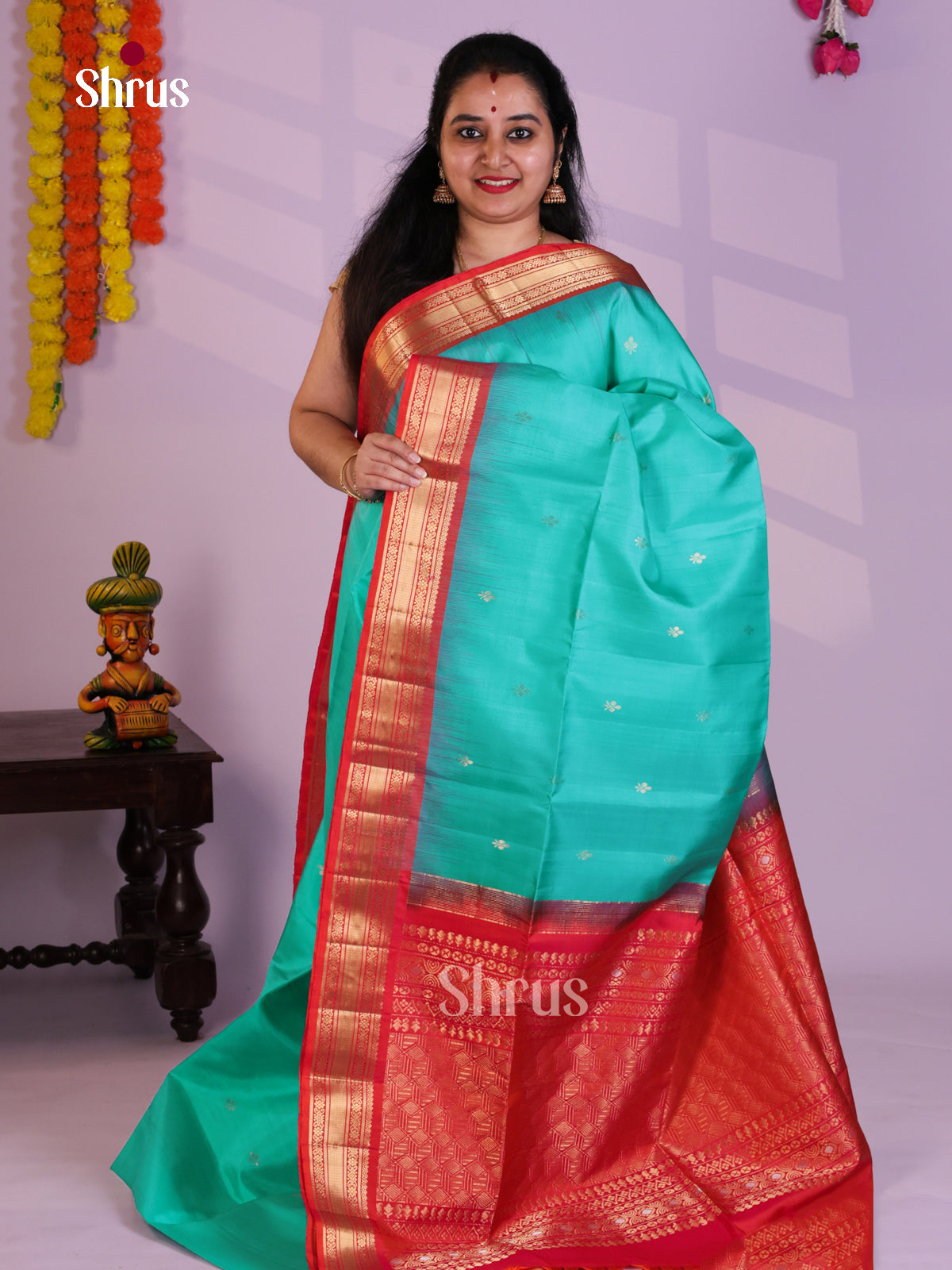 Buy Classy Turquoise Blue Soft Silk Saree with Small Buttas, Red Zari Woven Border & Pallu