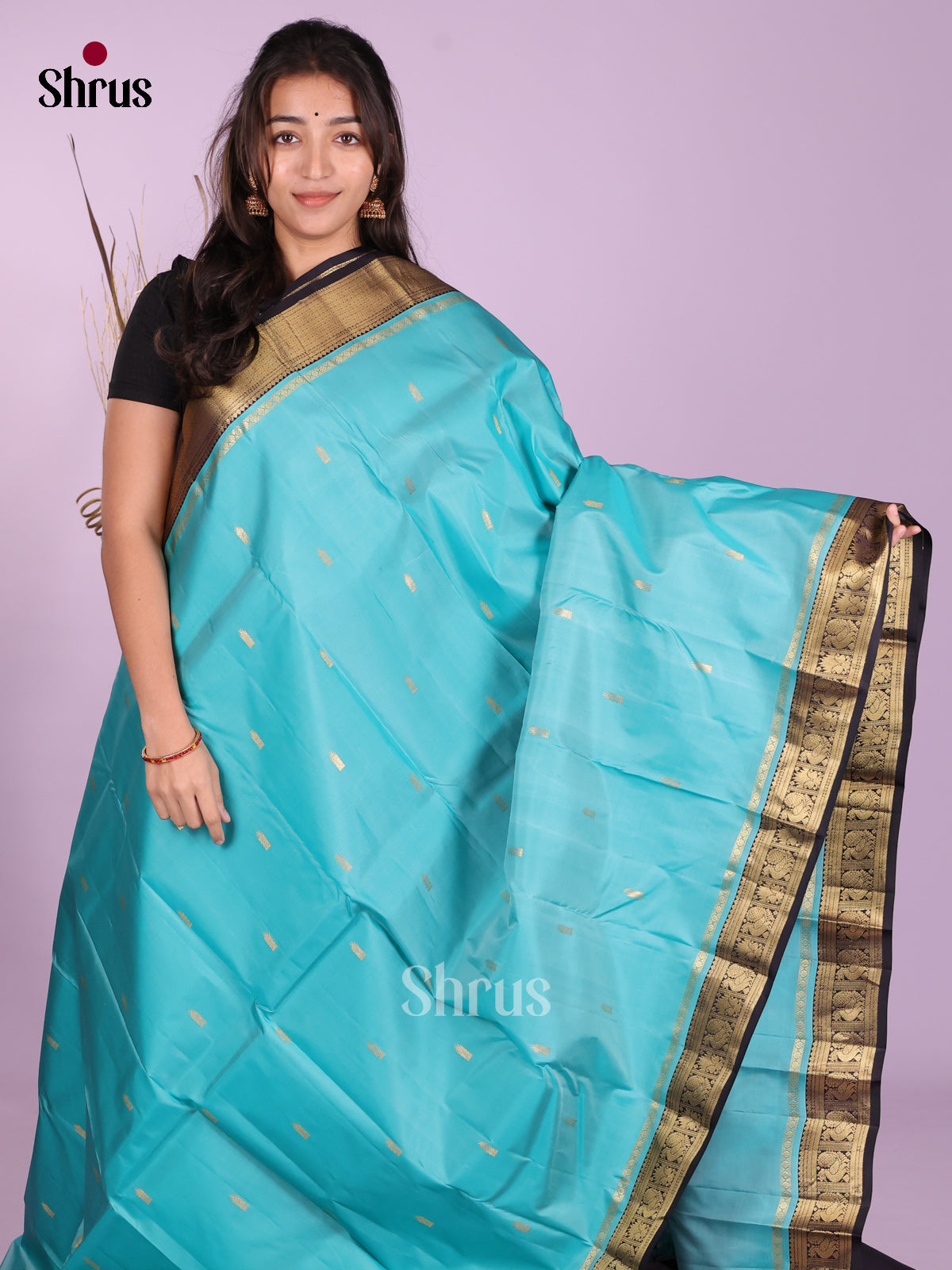 Buy Alluring Turquoise Kanjivaram Saree With Golden Buttis, Navy Blue Border & Brocade Pallu