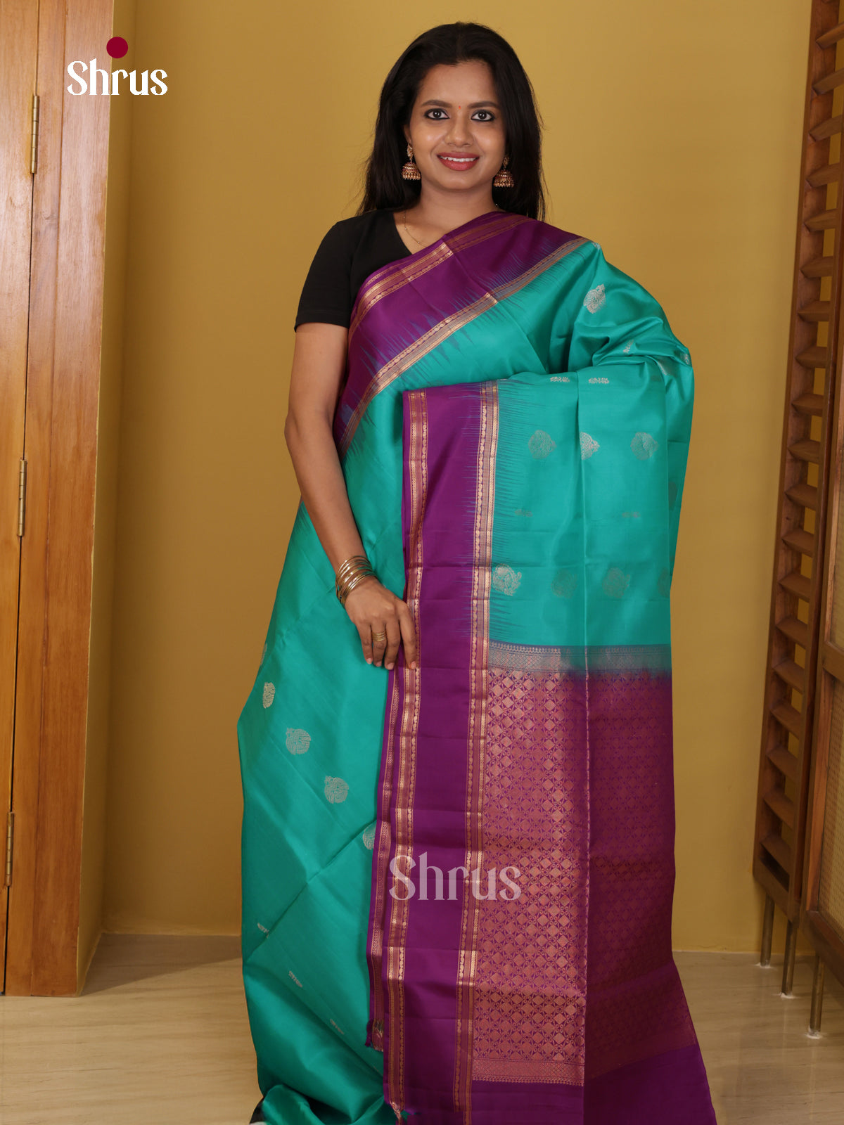 Buy Classy Turquoise Soft Silk Saree with Zari Floral Buttas, Purple Rettaipet Border & Brocade Pallu