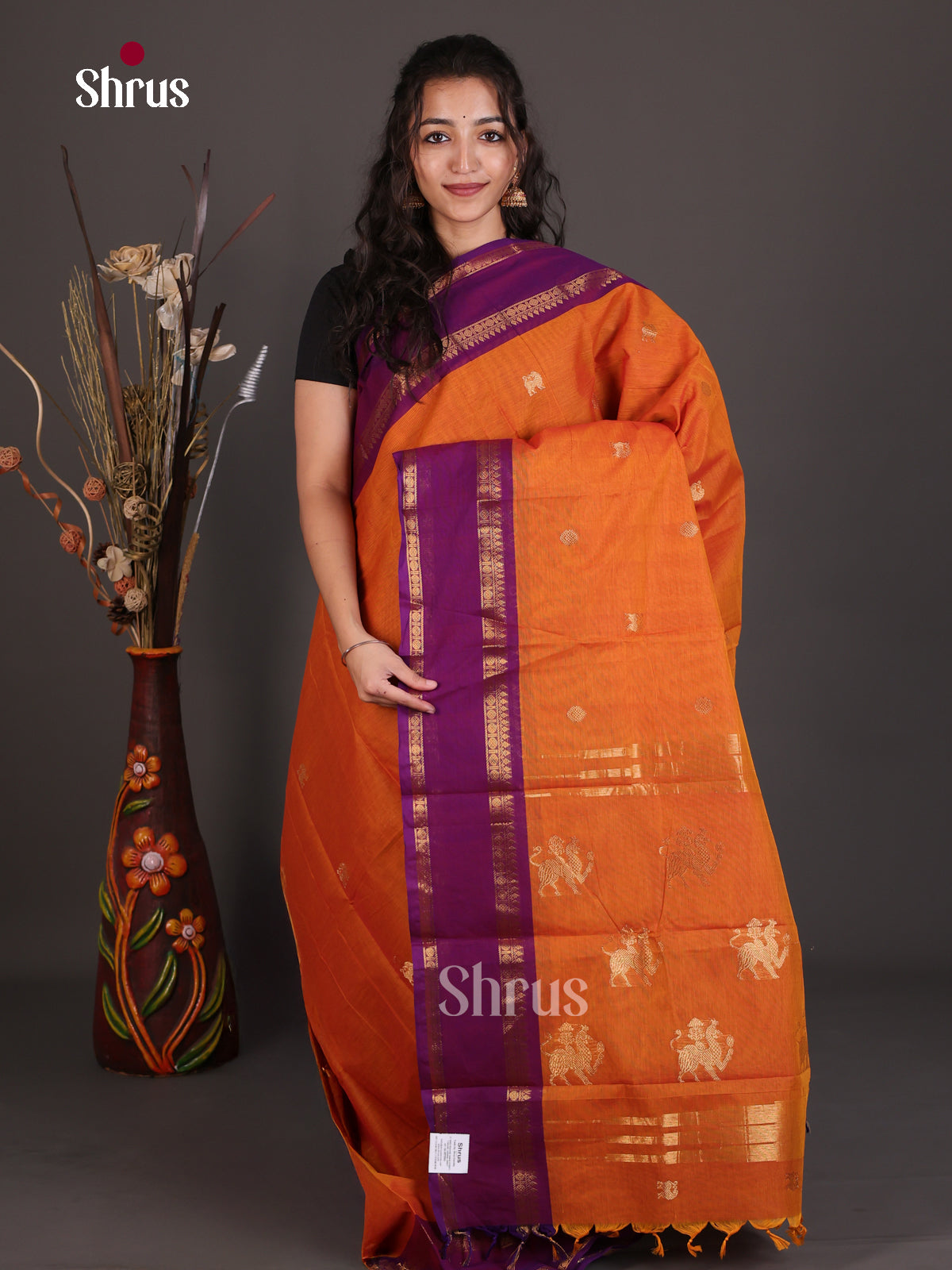 Vivid Orange Chettinad Cotton Saree With Gold Buttas, Purple Border & Zari Pallu With Yazhi Motifs