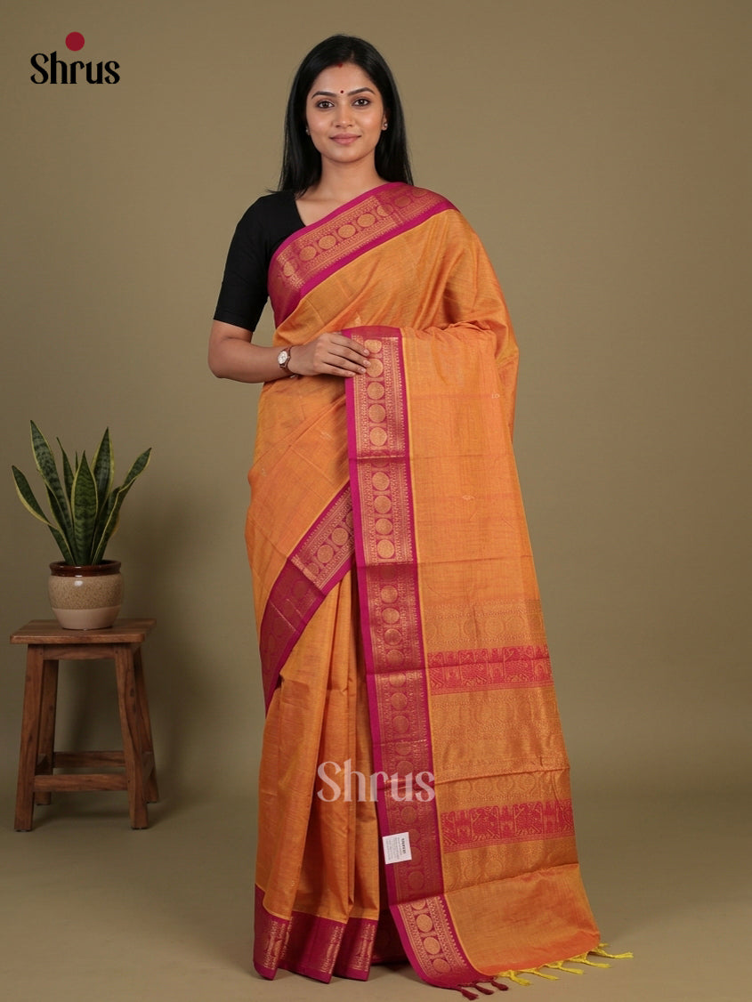 Vivid Orange Chettinad Cotton Saree With Golden Buttas & Pink Zari Border With Circular Motifs
