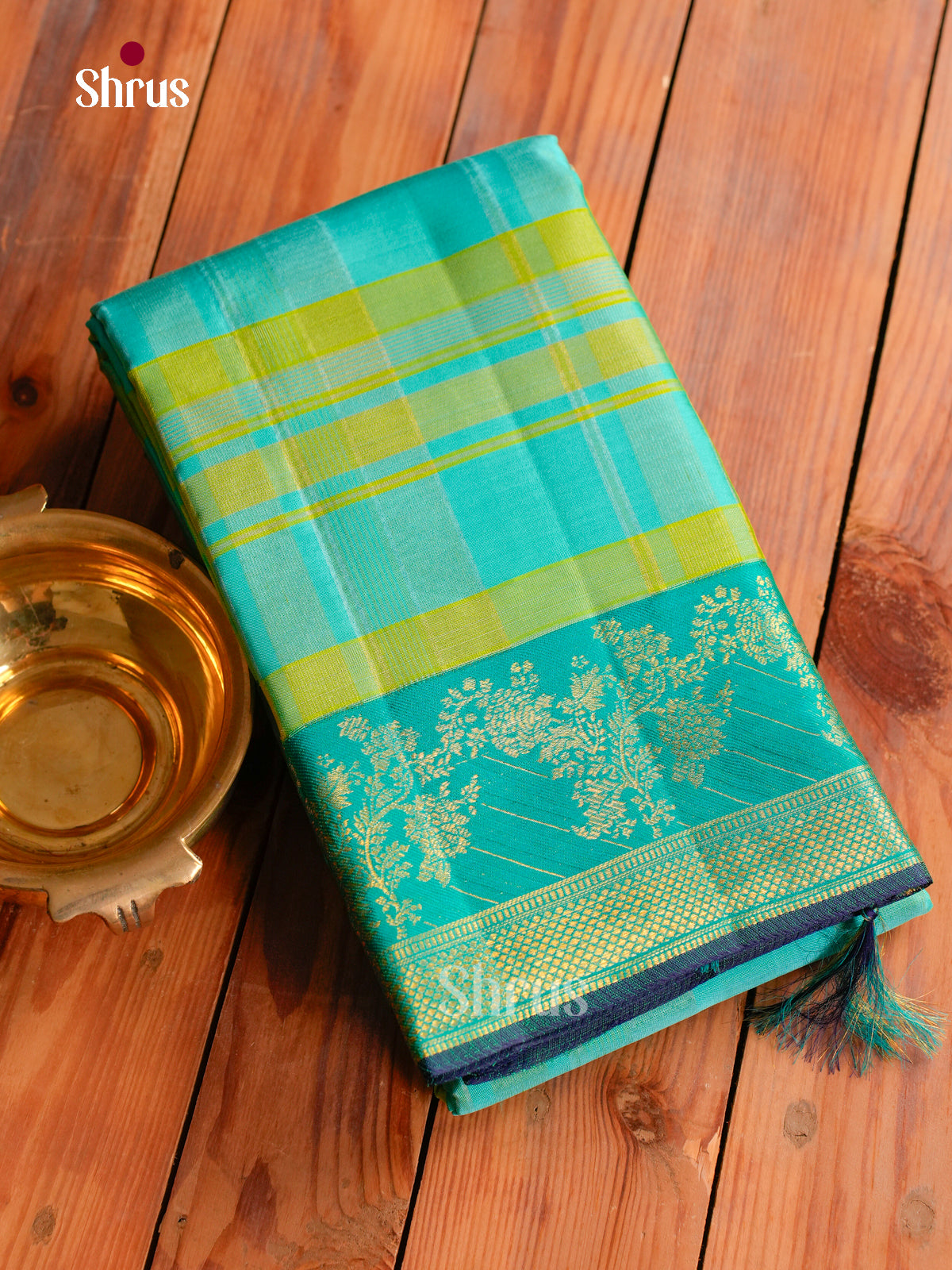 Vivid Sea Green Kanchipuram Saree With Bold Checks & Teal Border With Floral Vines