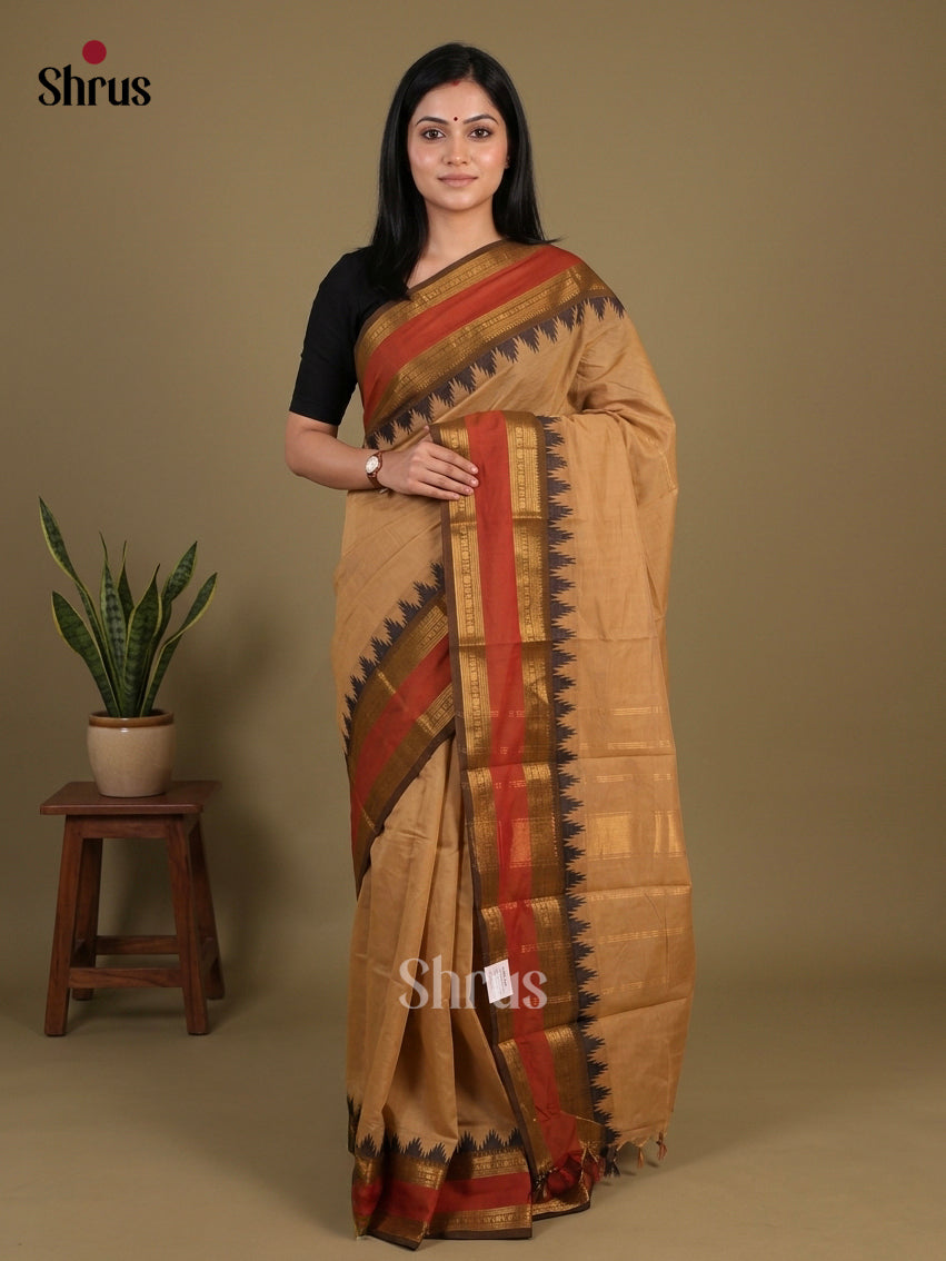 Warm Beige Chettinad Cotton Saree With Plain Body & Brown Rettapet Zari Border With Temple Pattern