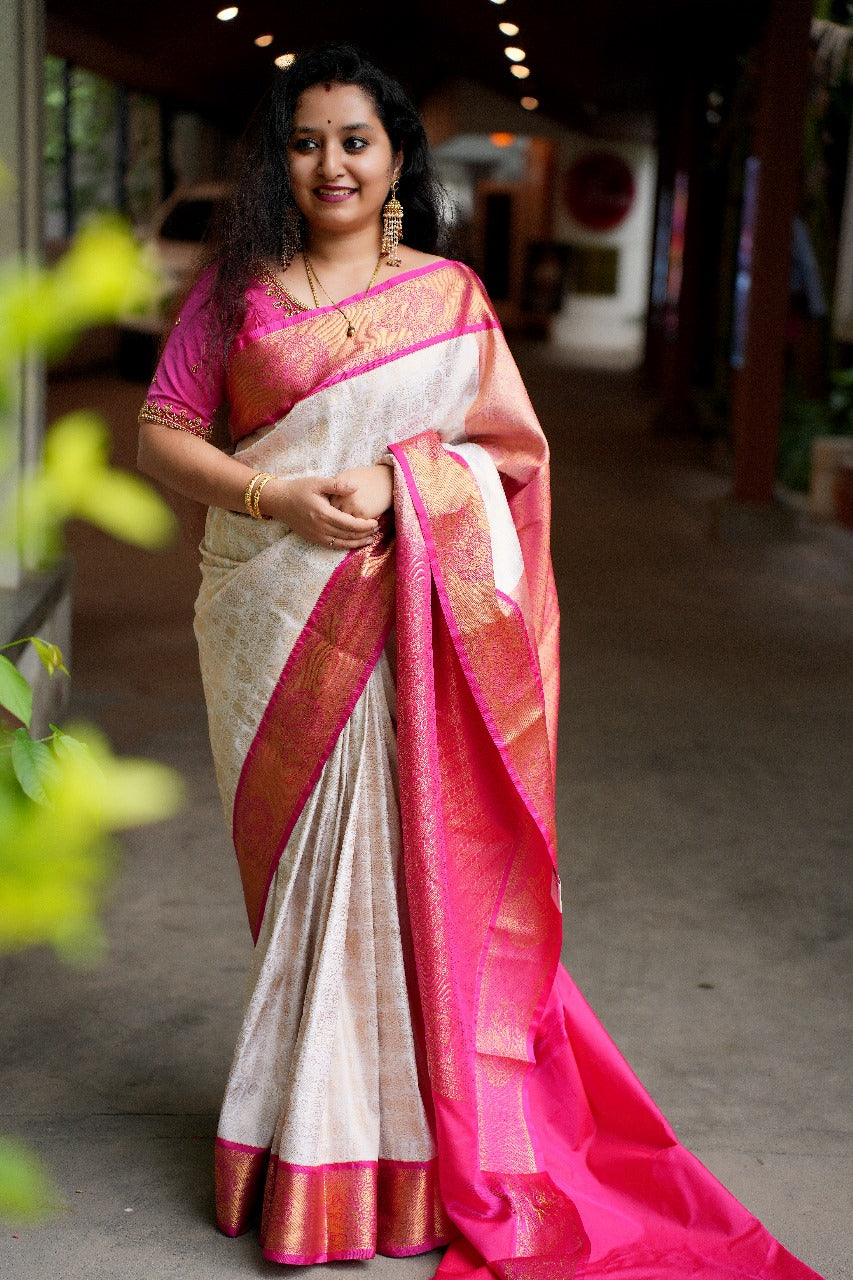 Cream & Pink- Semi Kanchipuram Saree with checkered Rudraksha & Peacock body patterns & with Gold zari borders - Shop on ShrusEternity.com