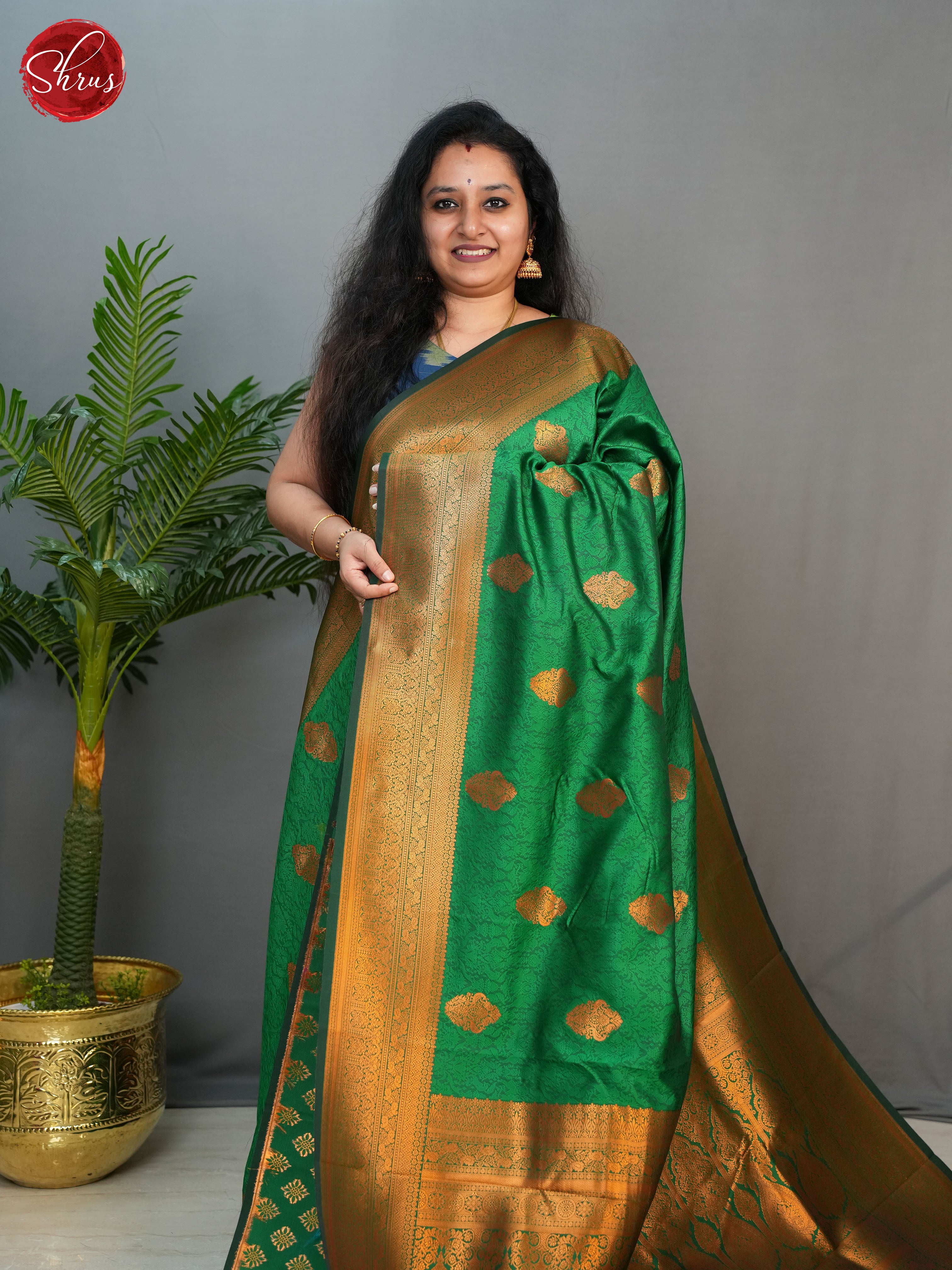 Green(Single tone)- Semi Kanchipuram with Zari woven floral motifs on the body & Contrast Zari Border - Shop on ShrusEternity.com