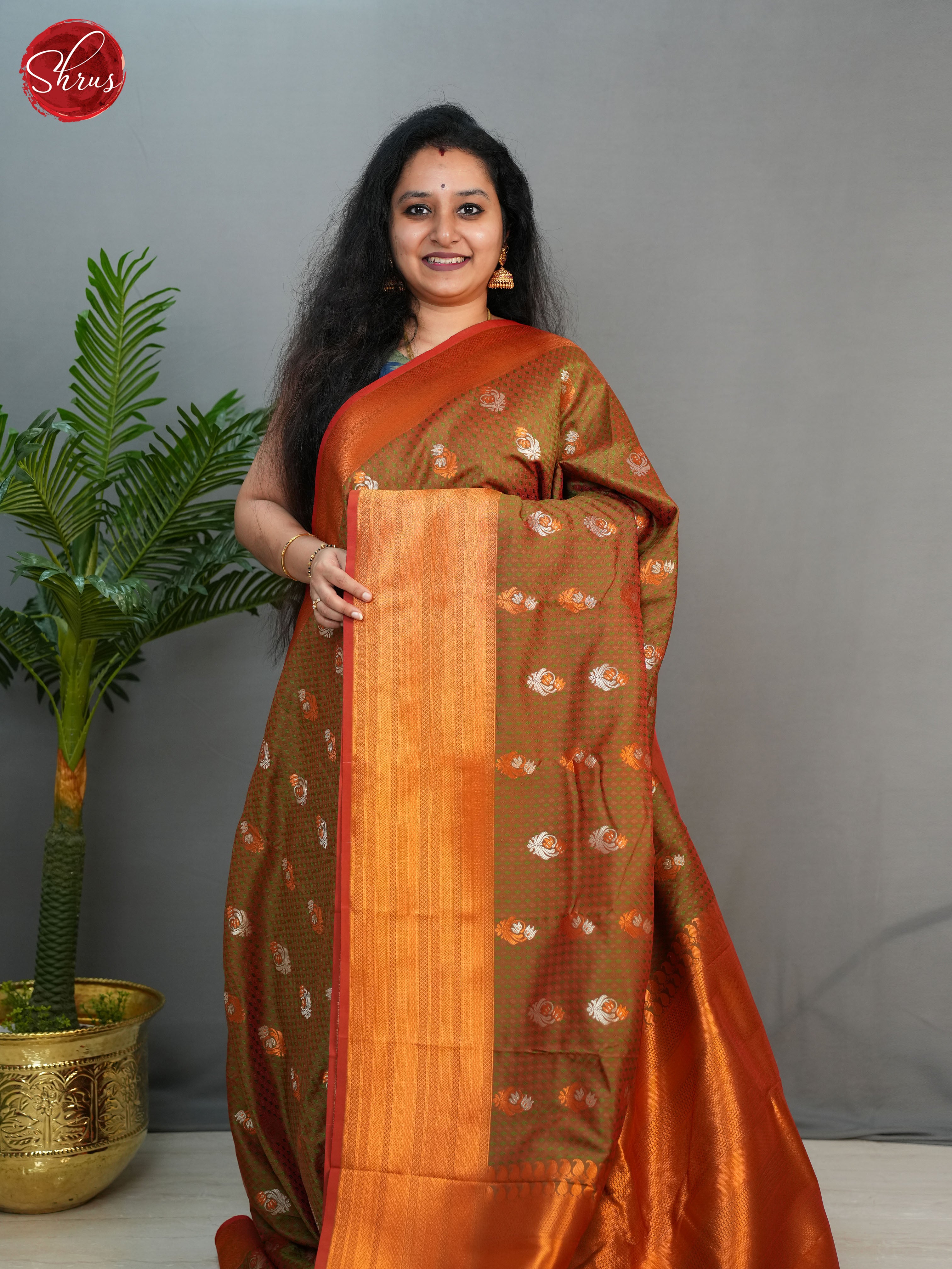 Double Shaded Green(Single Tone)- Semi Kanchipuram with Zari woven floral motifs , brocade on the body & Zari Border - Shop on ShrusEternity.com