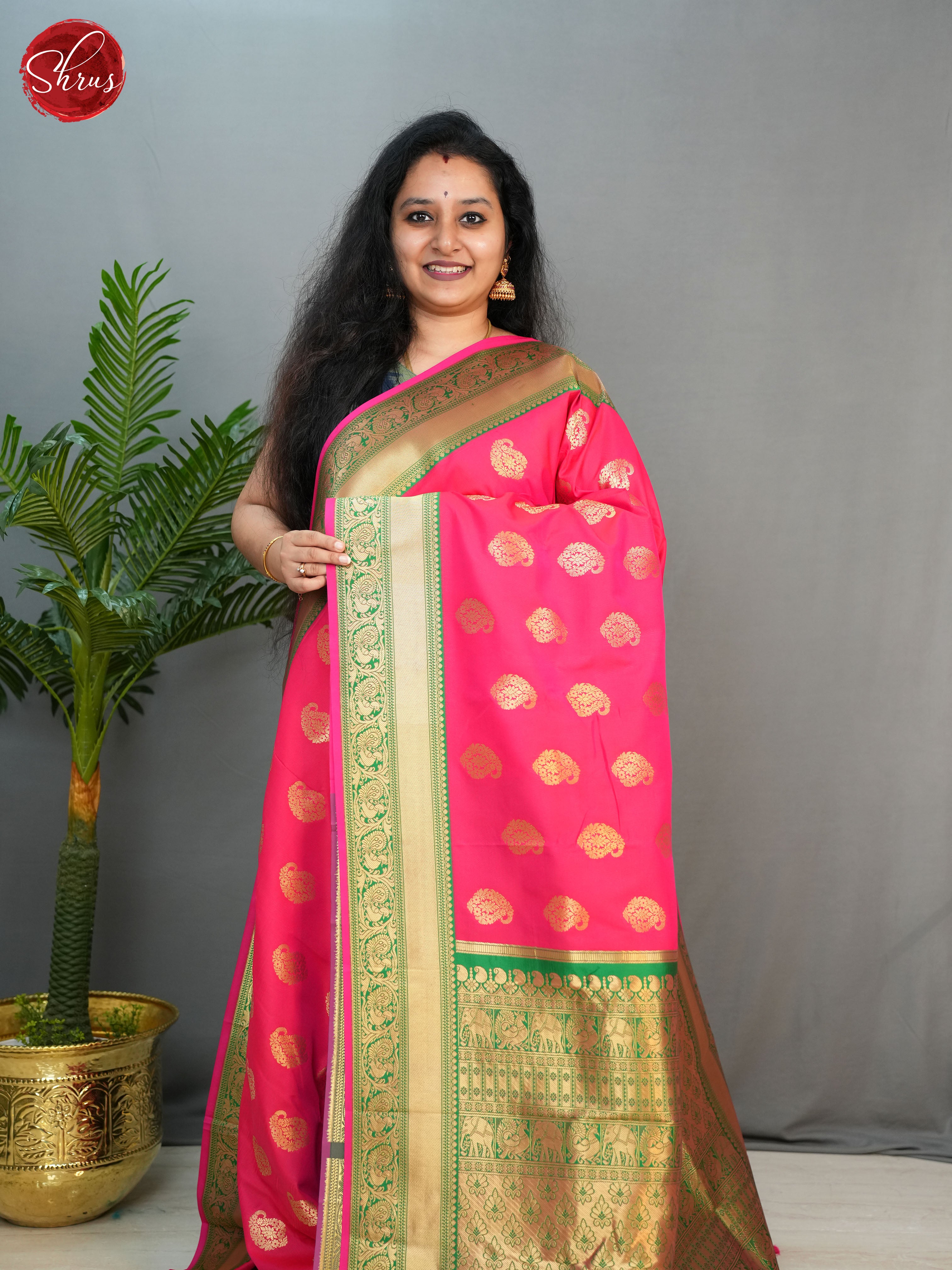 Rani Pink & Green - Semi Kanchipuram with Zari woven paisleys motifs on the body & Zari Border - Shop on ShrusEternity.com