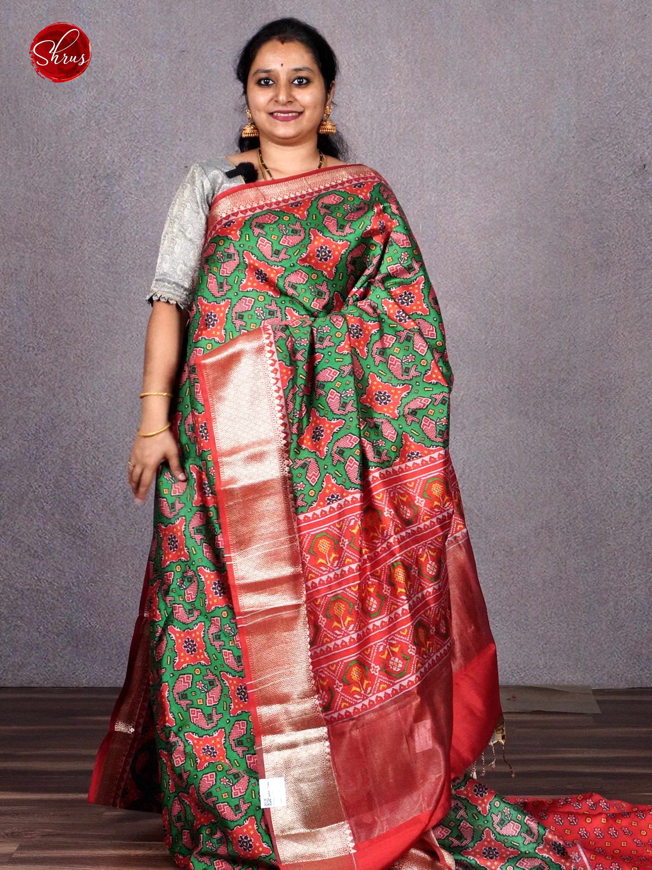 Green & Orange - Tussar with floral print on the body & Contrast Zari Border