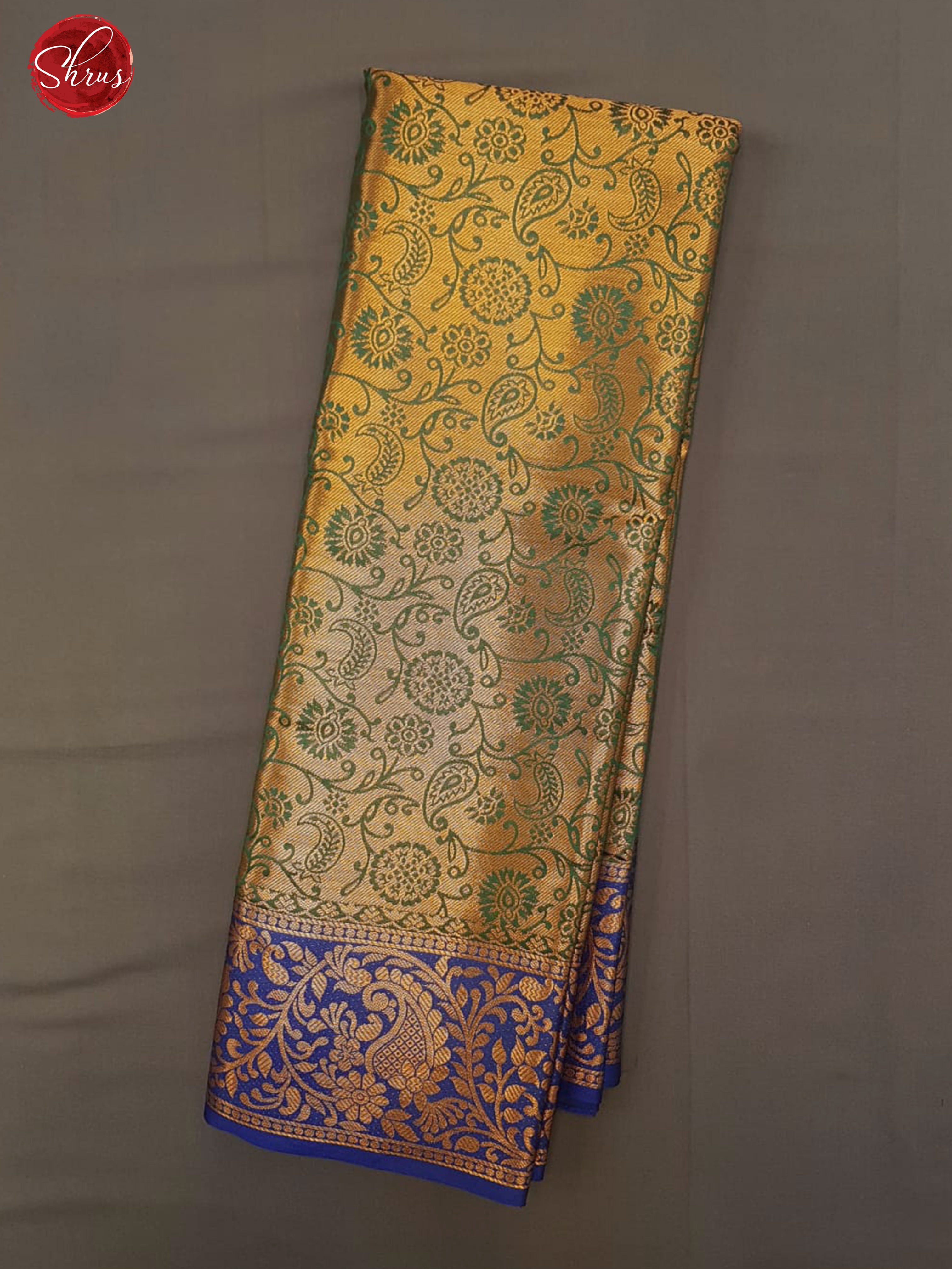 Green & Blue - Semi Kanchipuram Dola Silk with zari woven floral nestling brocade on the body& Zari Border - Shop on ShrusEternity.com
