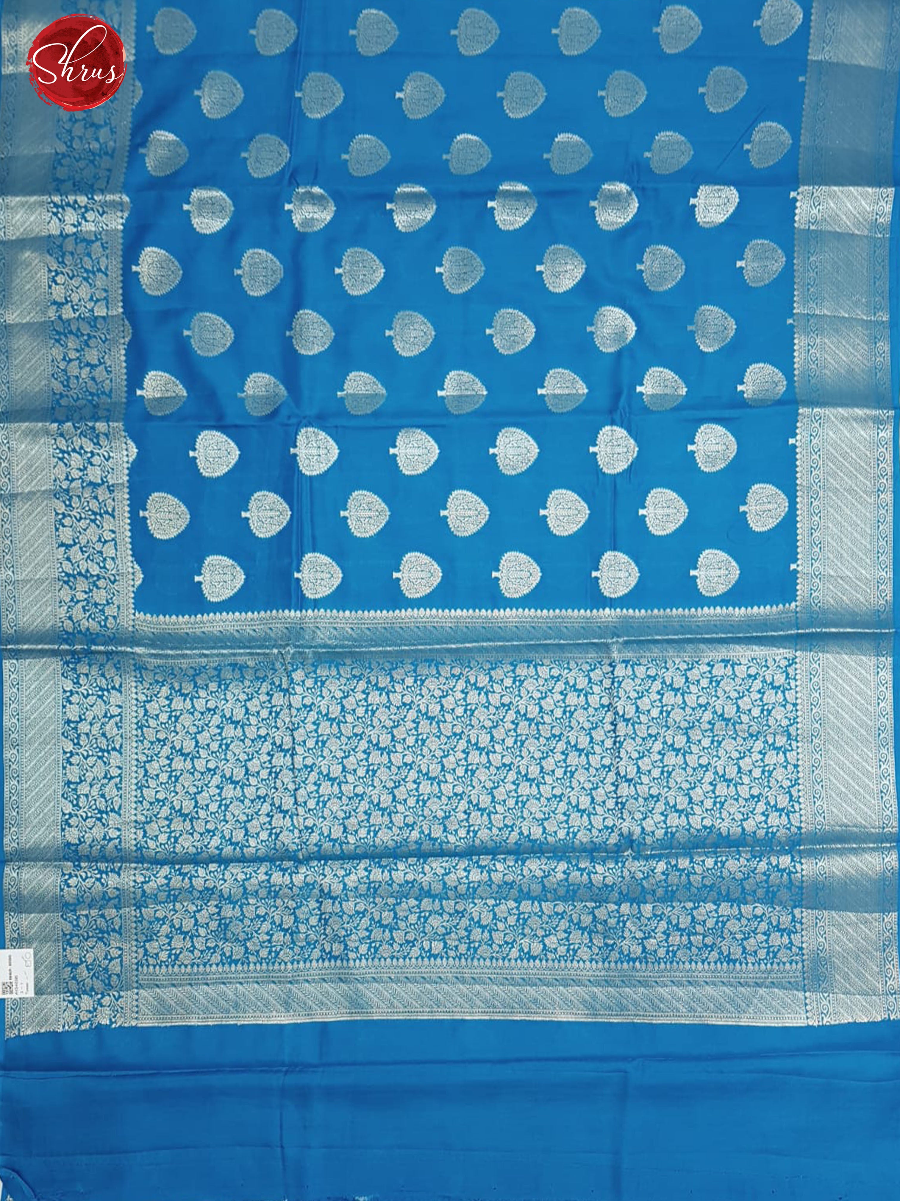 Blue(Single Tone)- Tussar with zari woven floral motifs on the body & Zari Border - Shop on ShrusEternity.com