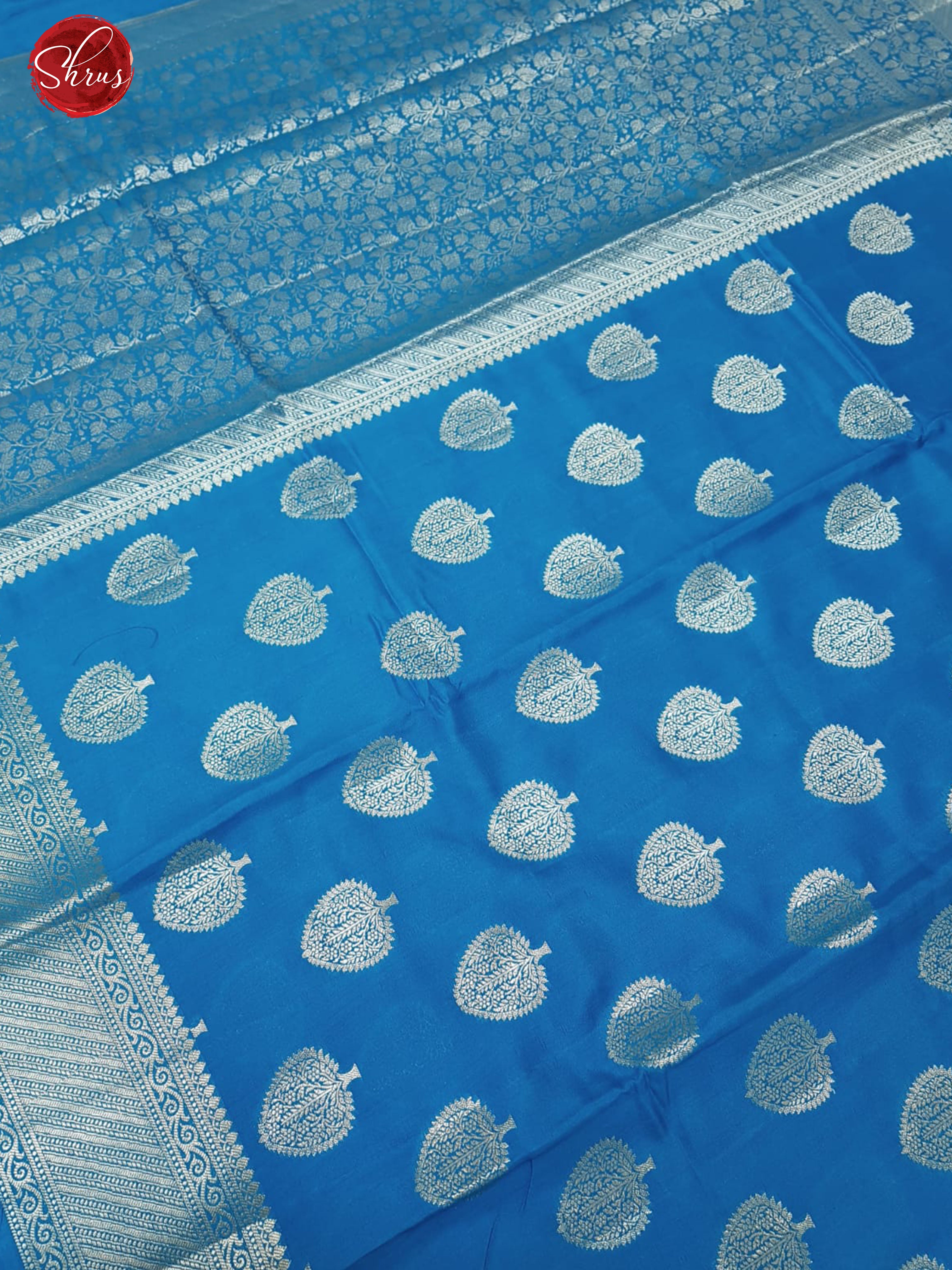 Blue(Single Tone)- Tussar with zari woven floral motifs on the body & Zari Border - Shop on ShrusEternity.com