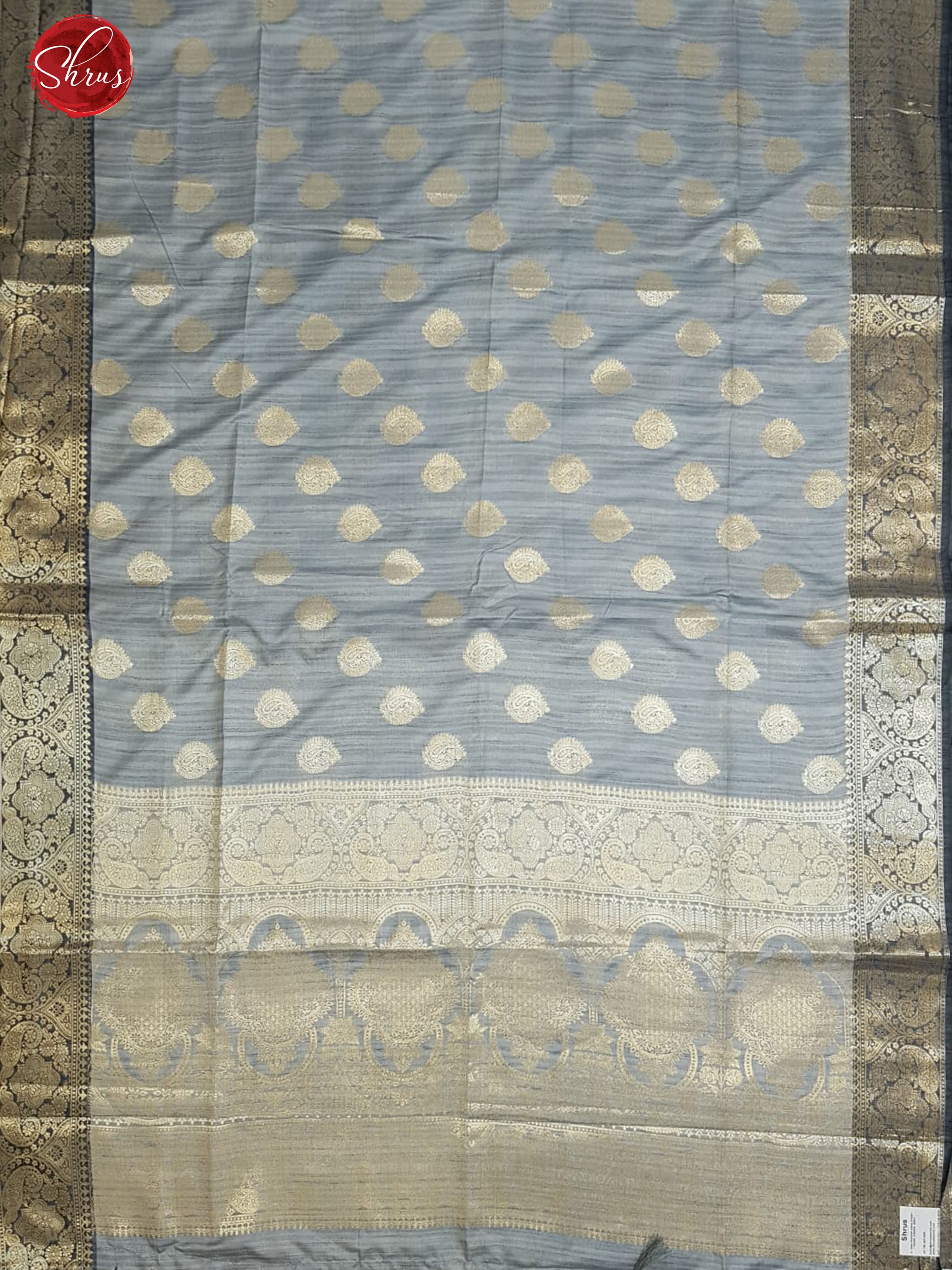 Grey(Single Tone)- Semi Banarasi with zari woven floral motifs on the body& Zari Border - Shop on ShrusEternity.com