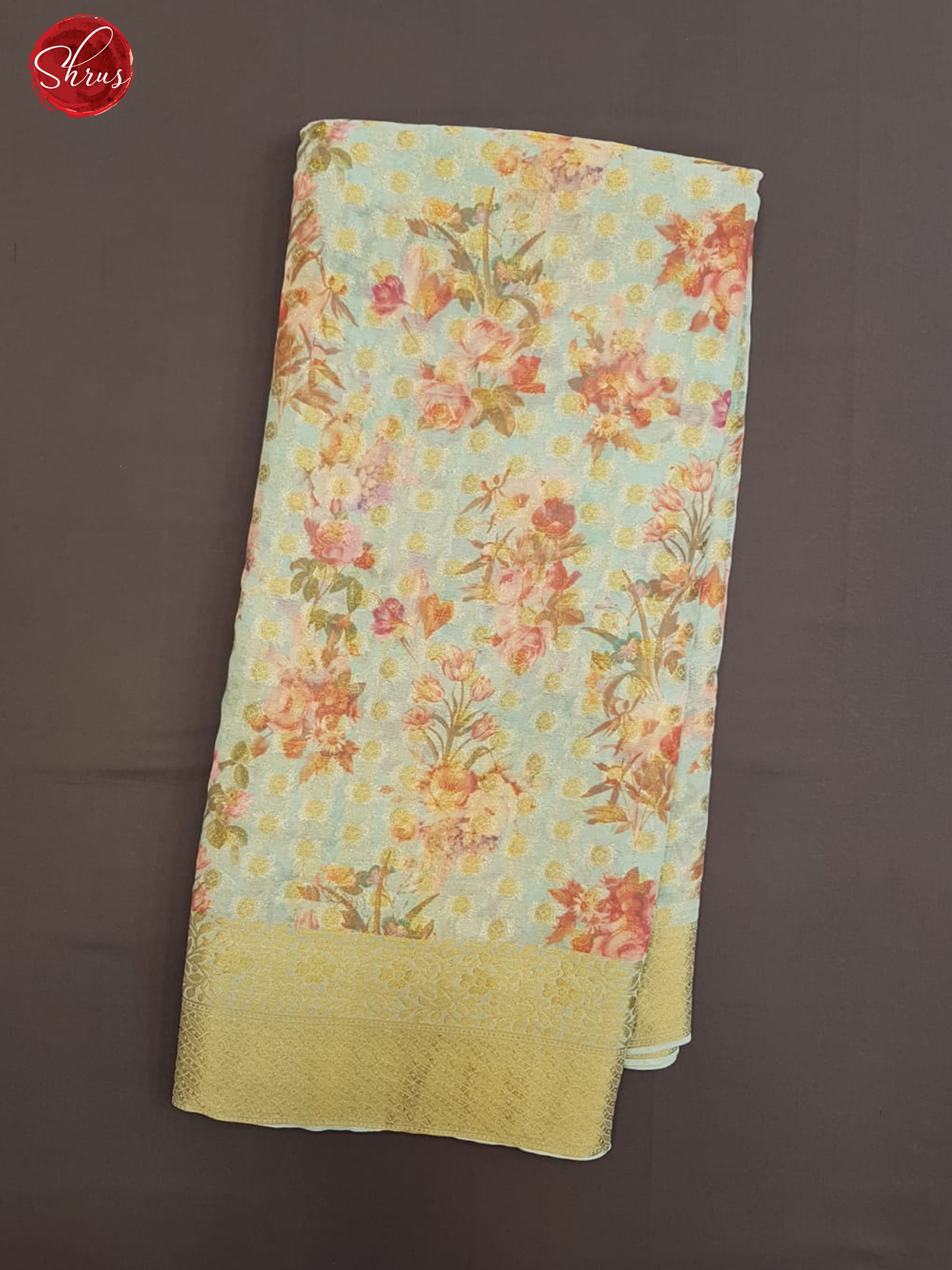 Blue(Single tone)- Semi Chiffon with zari floral buttas, floral print on the body & Zari Border - Shop on ShrusEternity.com