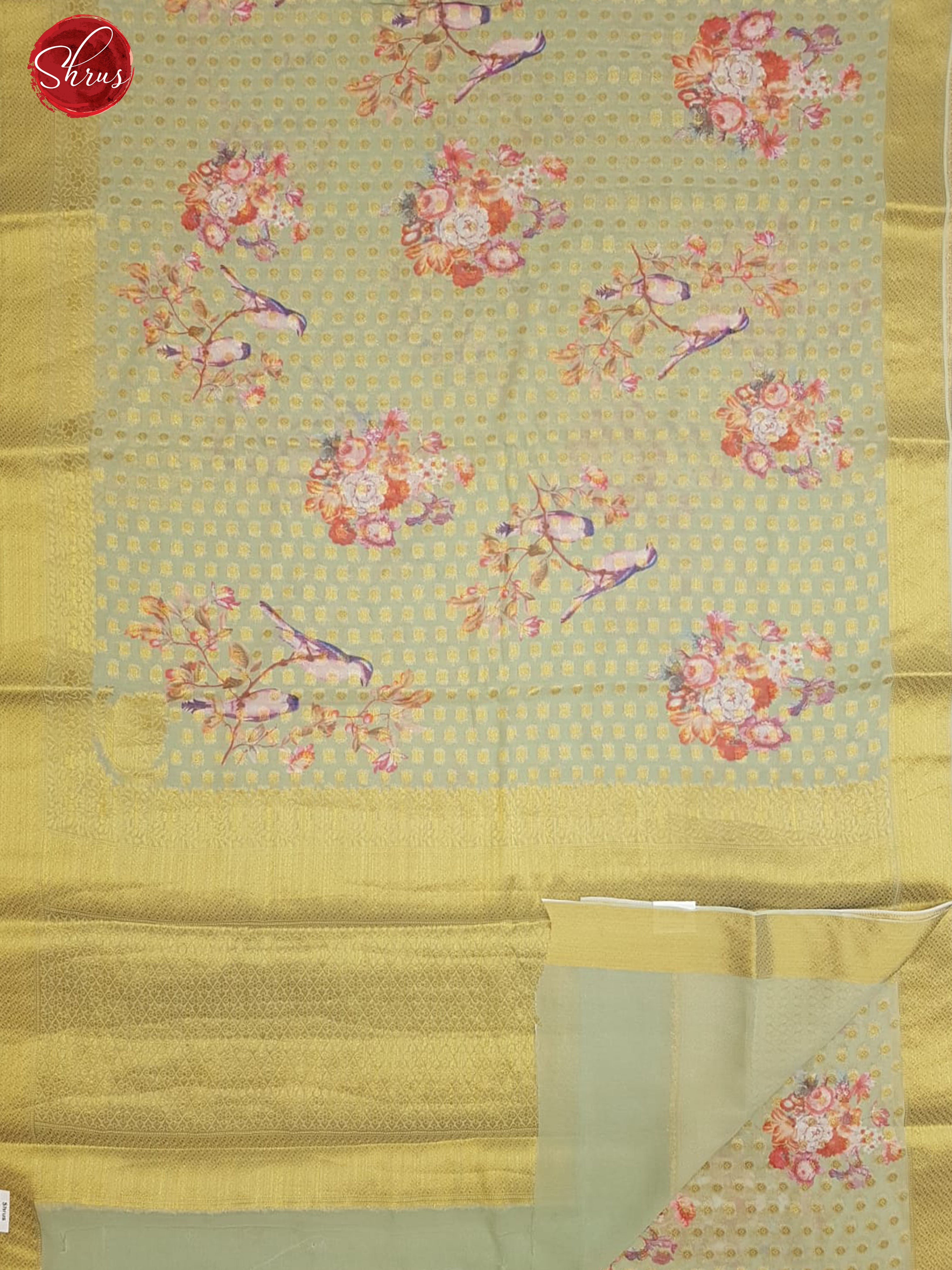 Pista Green(Single tone)- Semi Chiffon with zari floral buttas , floral print on the body & Zari Border - Shop on ShrusEternity.com