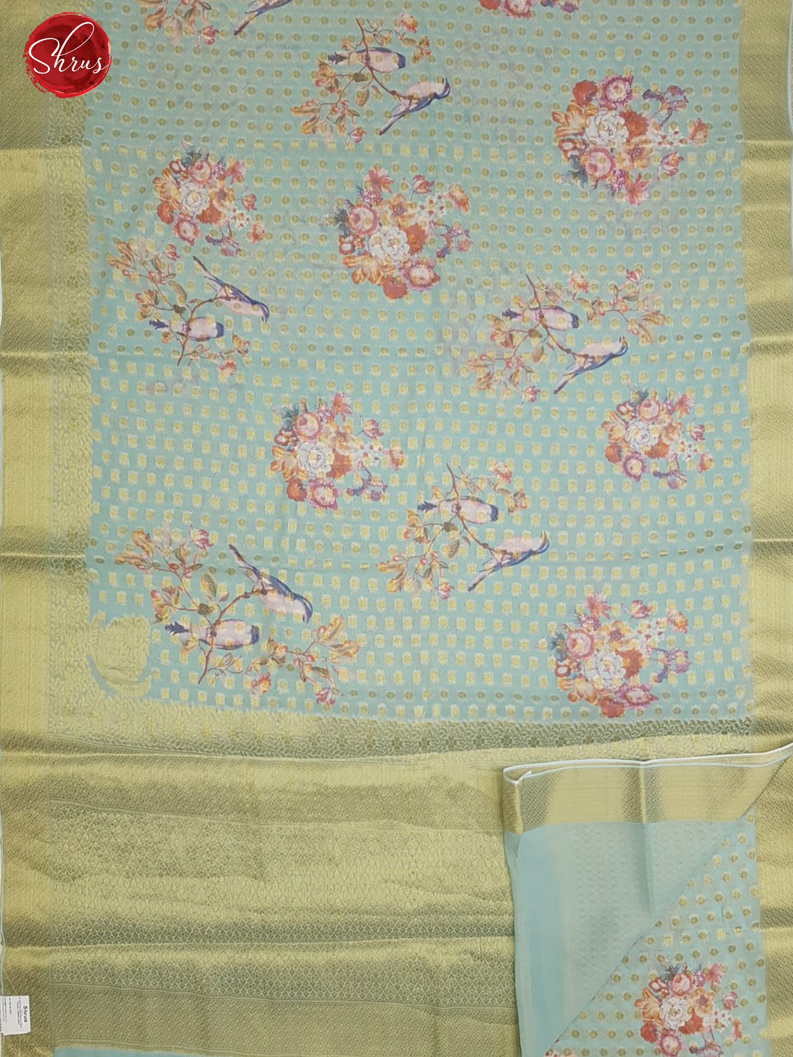 Blue(Single tone)- Semi Chiffon with zari floral buttas , floral print on the body & Zari Border - Shop on ShrusEternity.com