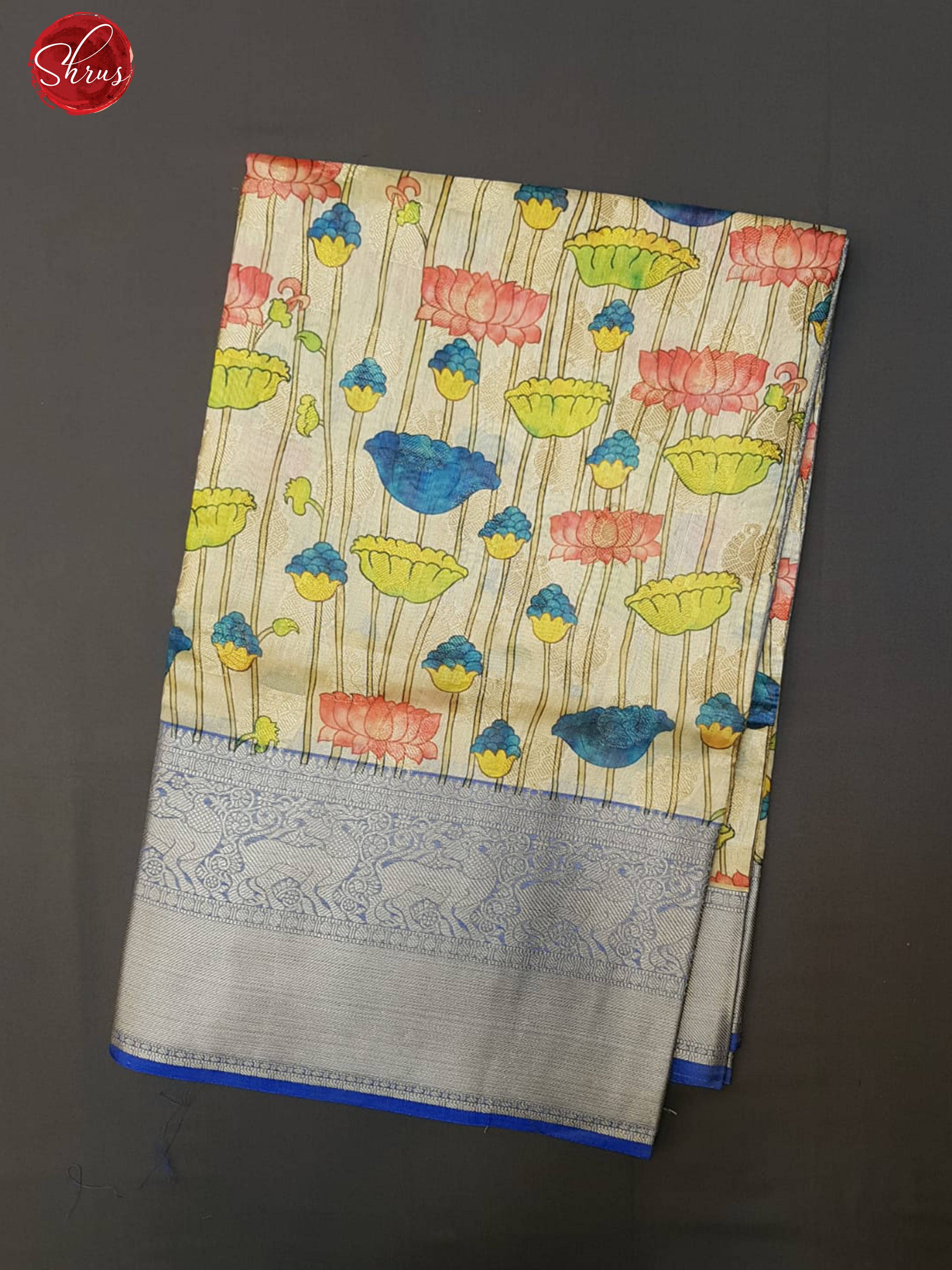 Cream & Blue -Semi Dupion with floral print on the body and contrast zari border - Shop on ShrusEternity.com