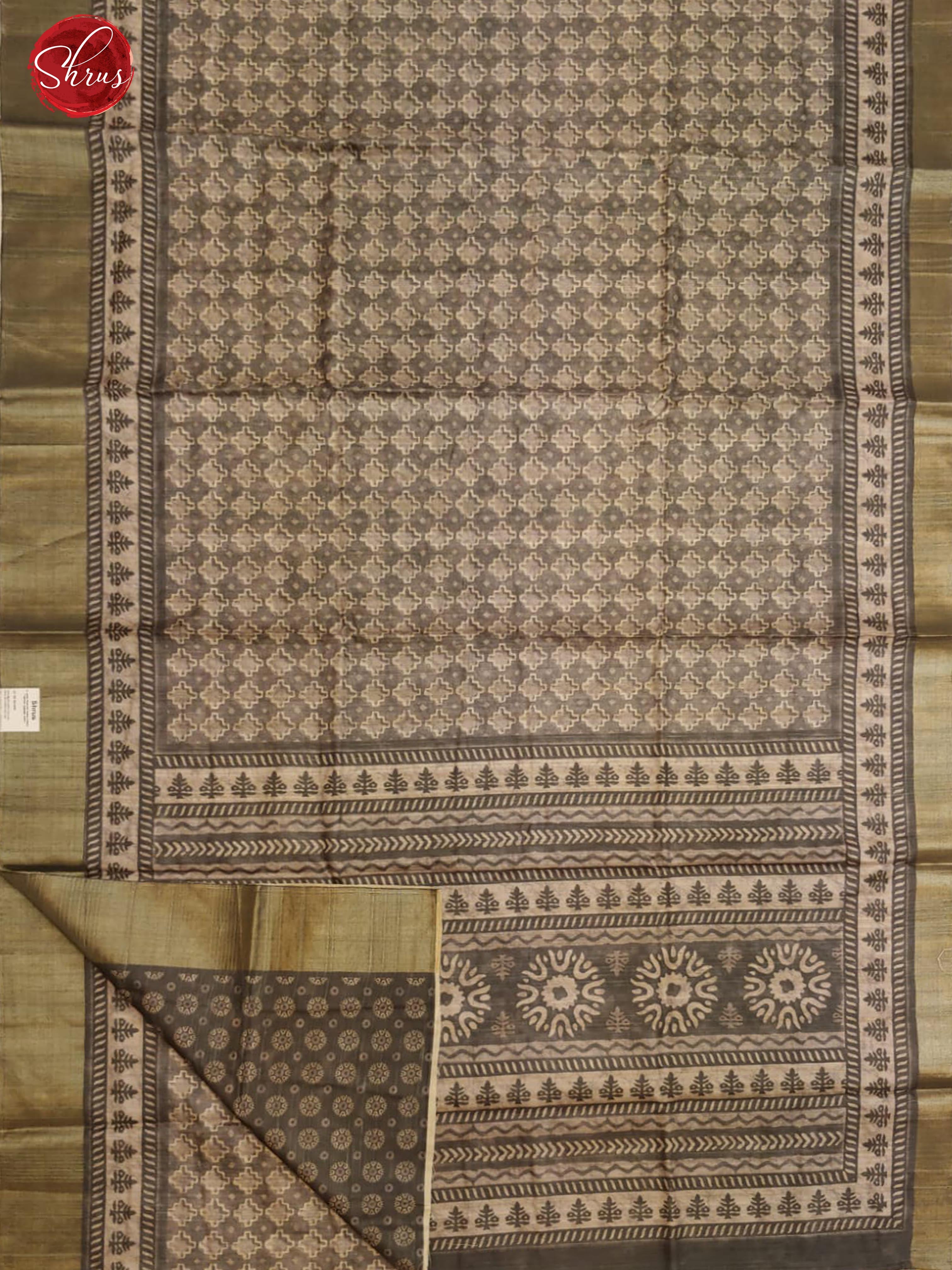 Grey (Single Tone)-Semi Tussar with floral print on the body & zari border - Shop on ShrusEternity.com