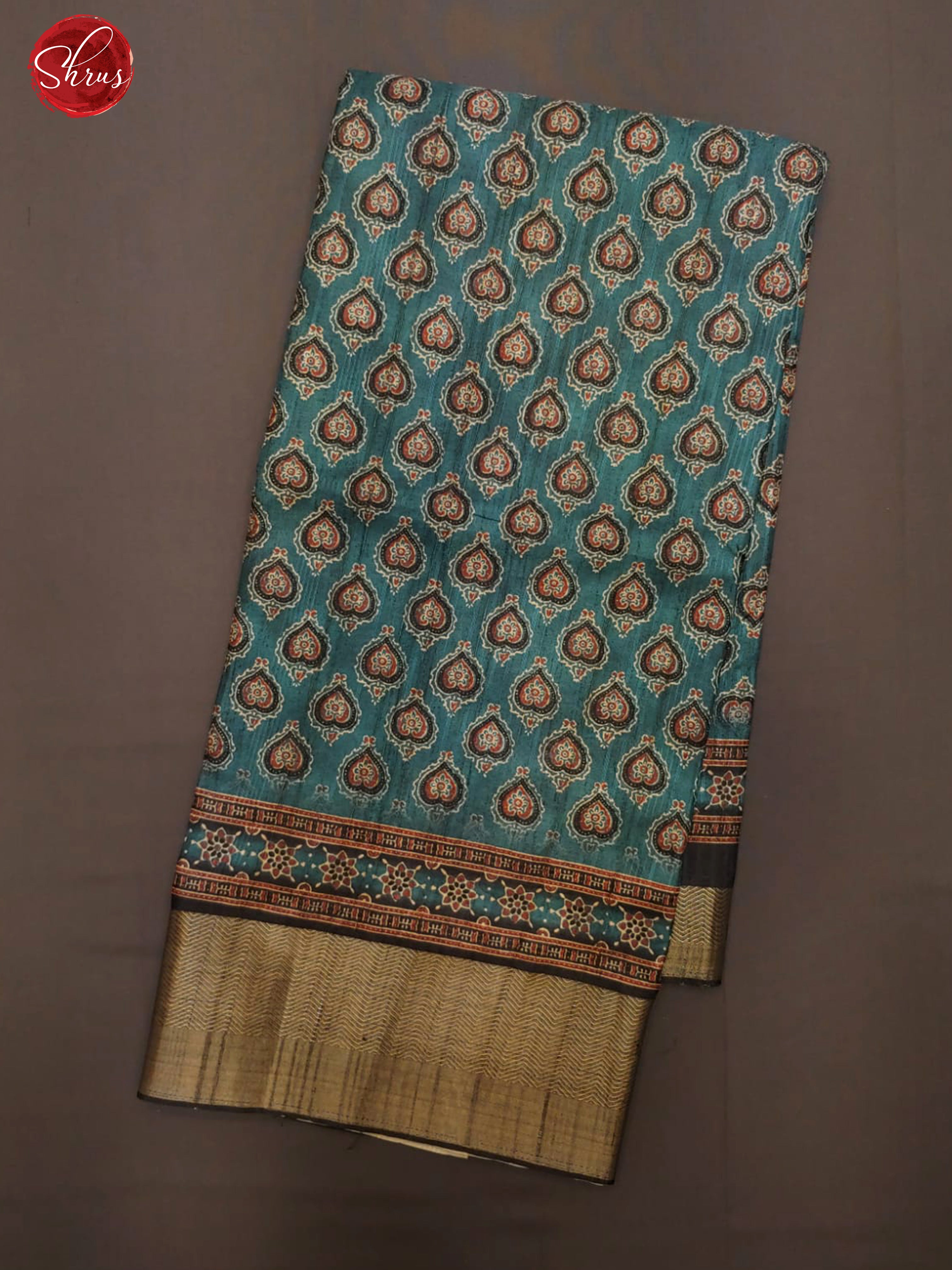 Blue & Black - Semi Tussar with floral print on the body & zari border - Shop on ShrusEternity.com