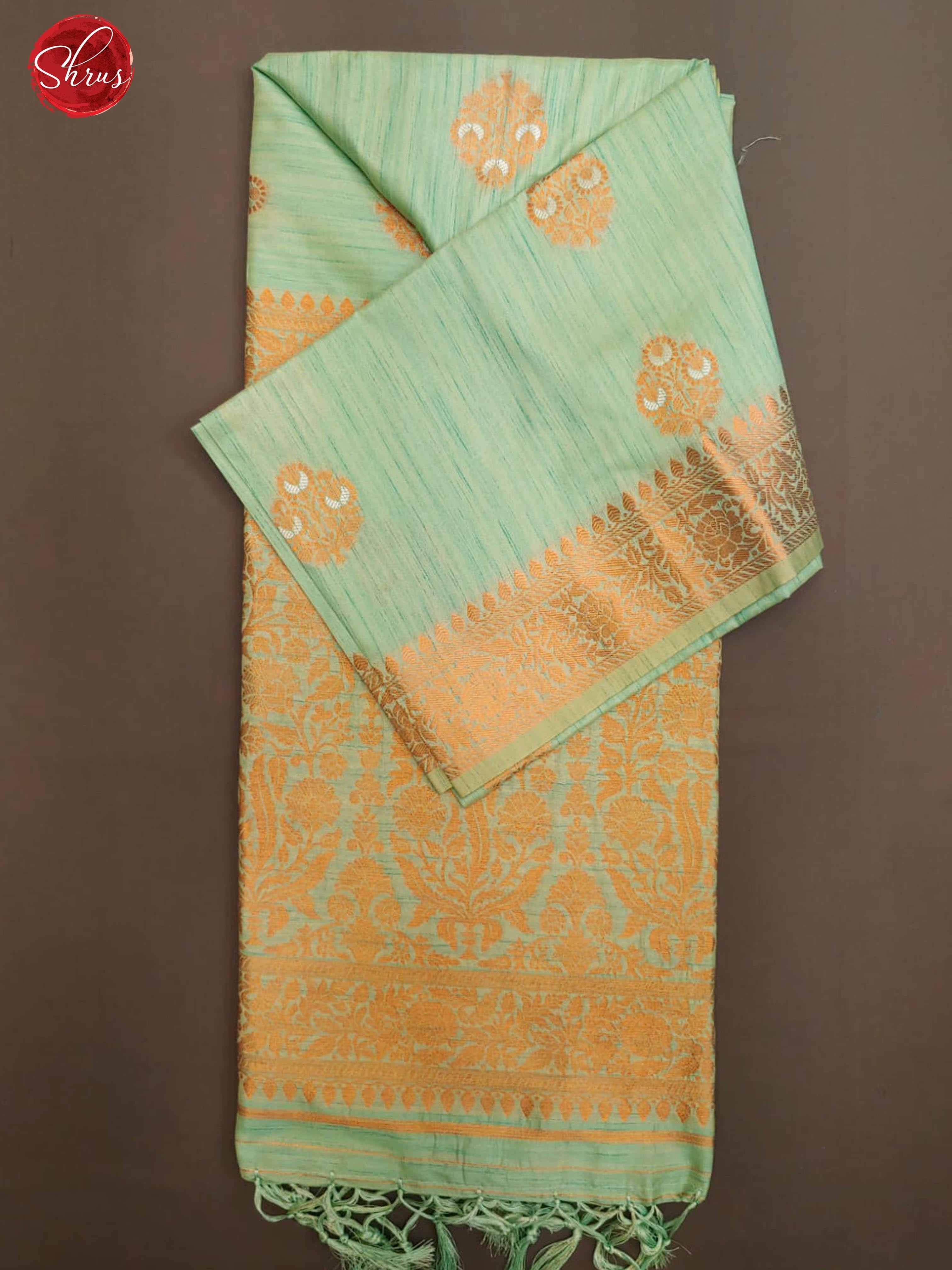 Teal Blue(Single Tone) - Semi Banarasi with zari woven floral motifs on the body& Zari Border - Shop on ShrusEternity.com