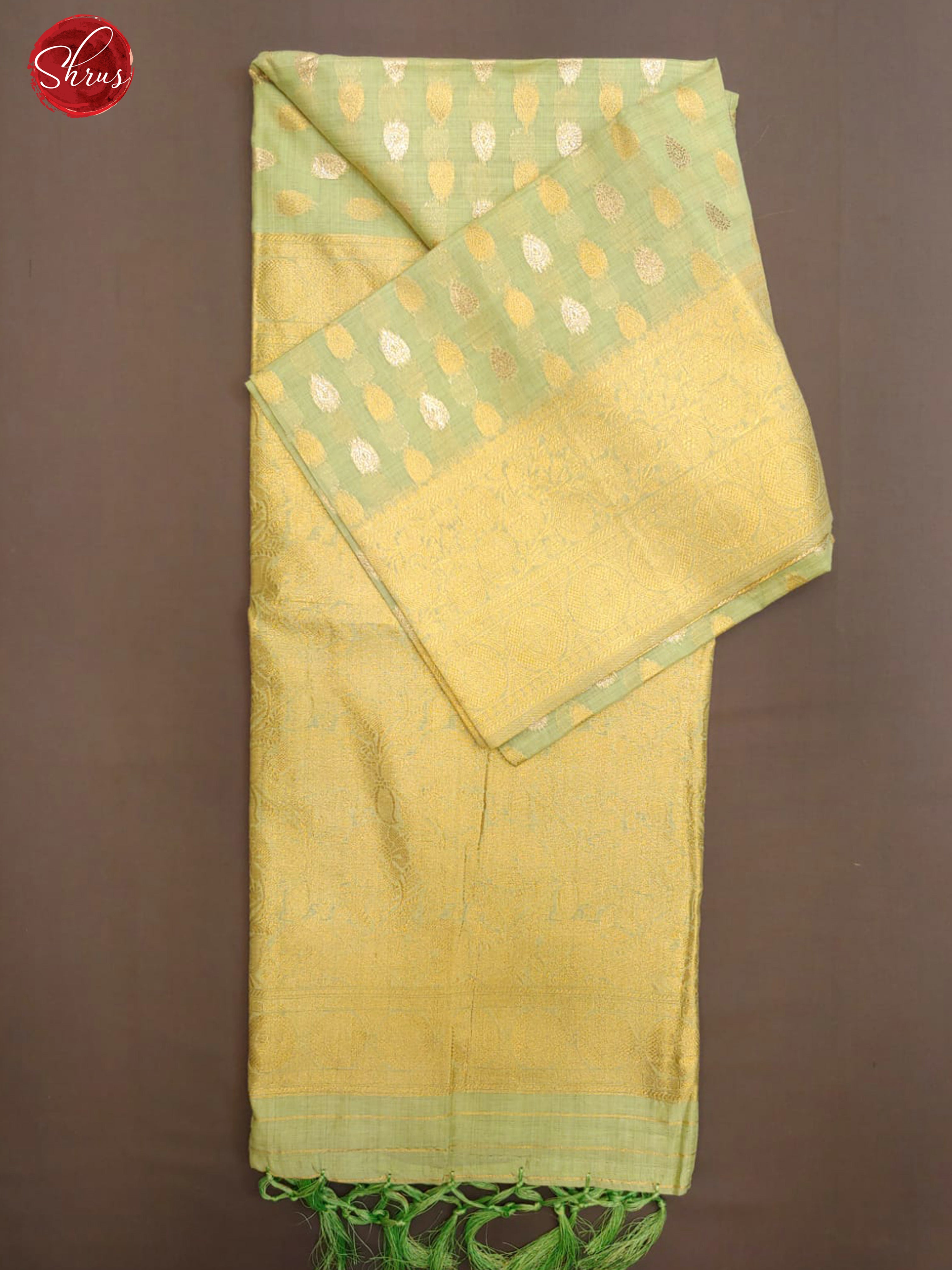 Pastel Green(Single Tone) - Semi Banarasi with zari woven floral buttas on the body& Zari Border - Shop on ShrusEternity.com