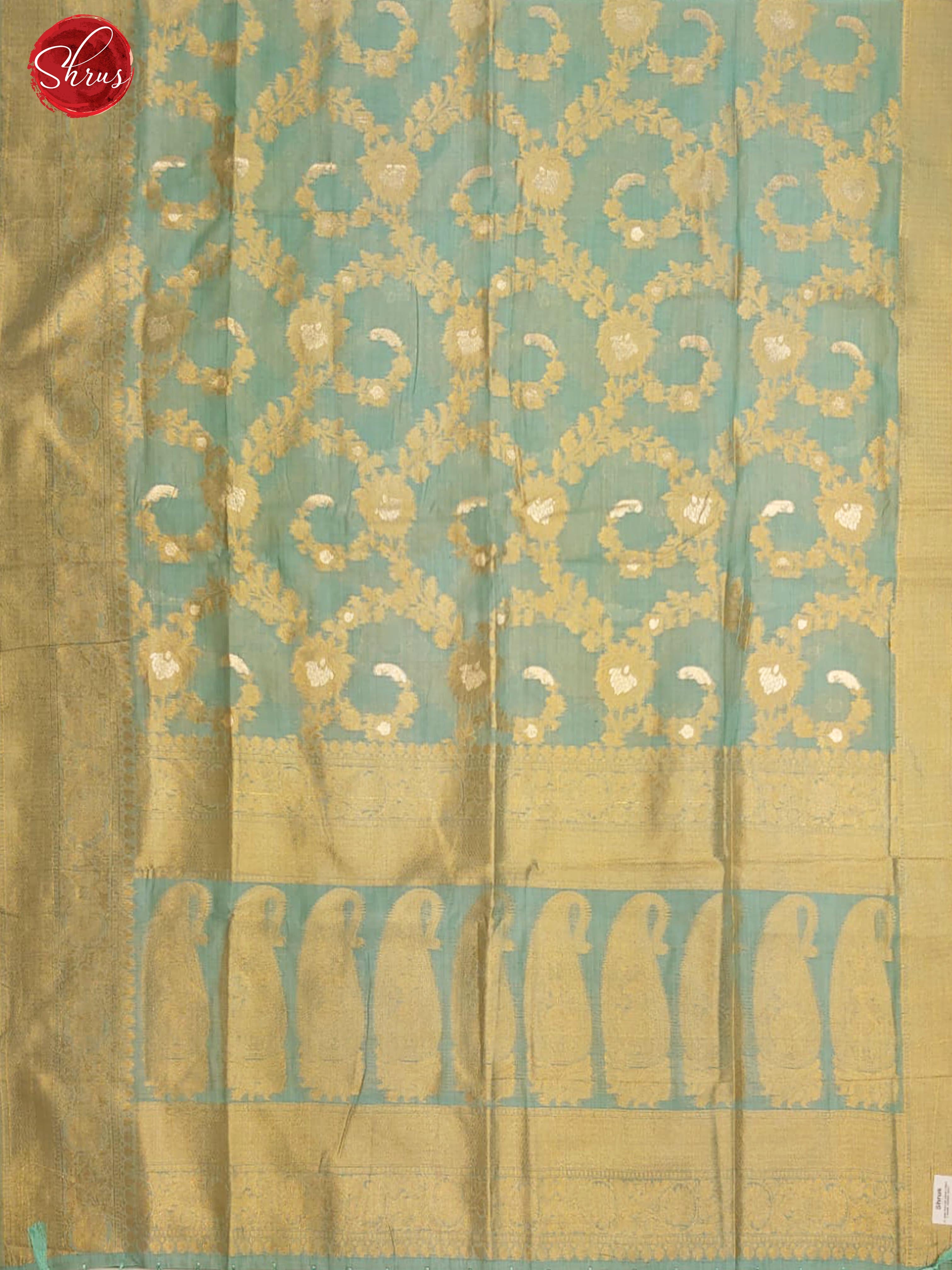 Teal Blue(Single Tone) - Semi Banarasi with zari woven floral brocade on the body& Zari Border - Shop on ShrusEternity.com