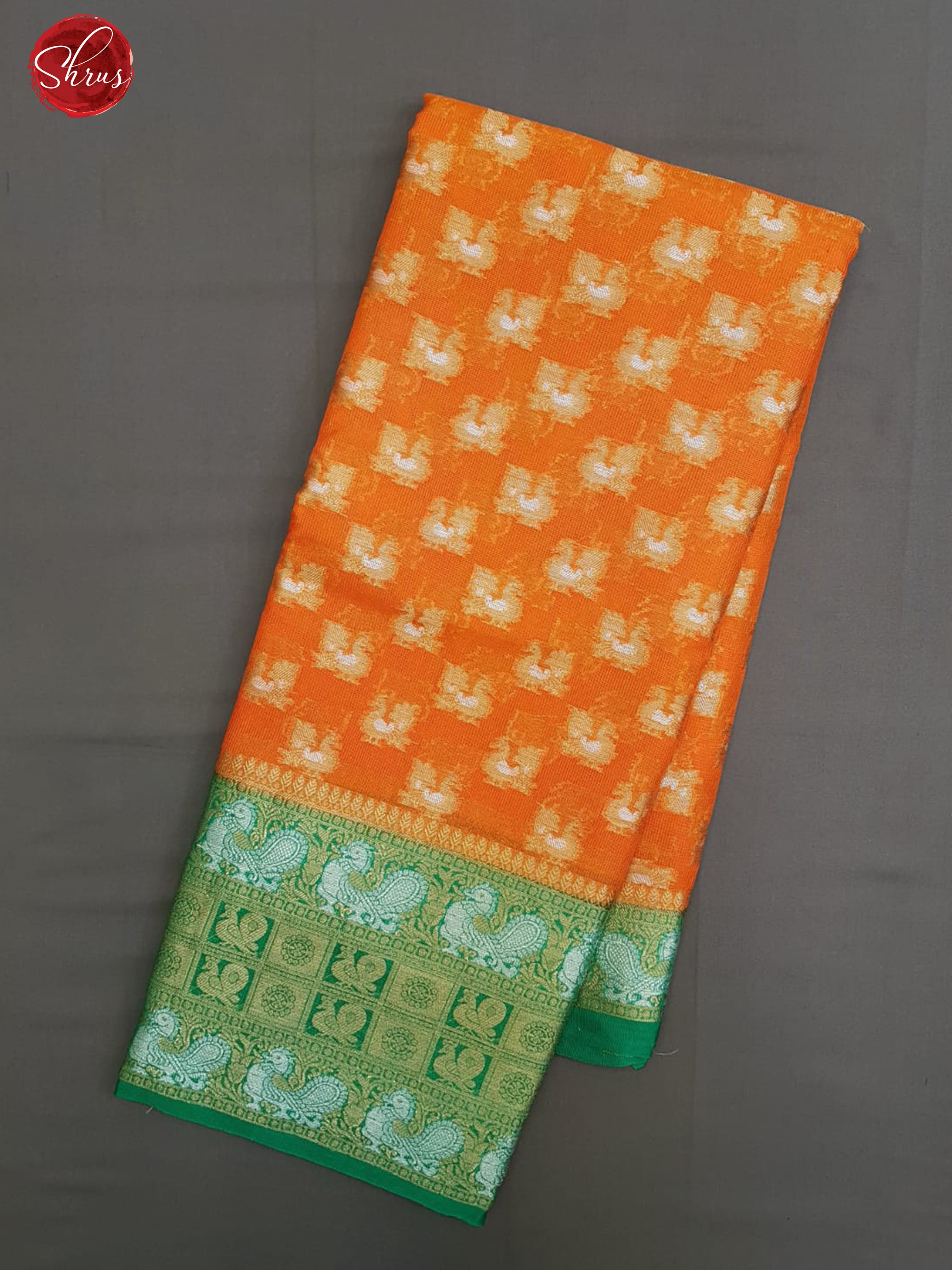 Orange And Green - Kota Banarasi with zari woven peacock buttas on the body and zari border - Shop on ShrusEternity.com