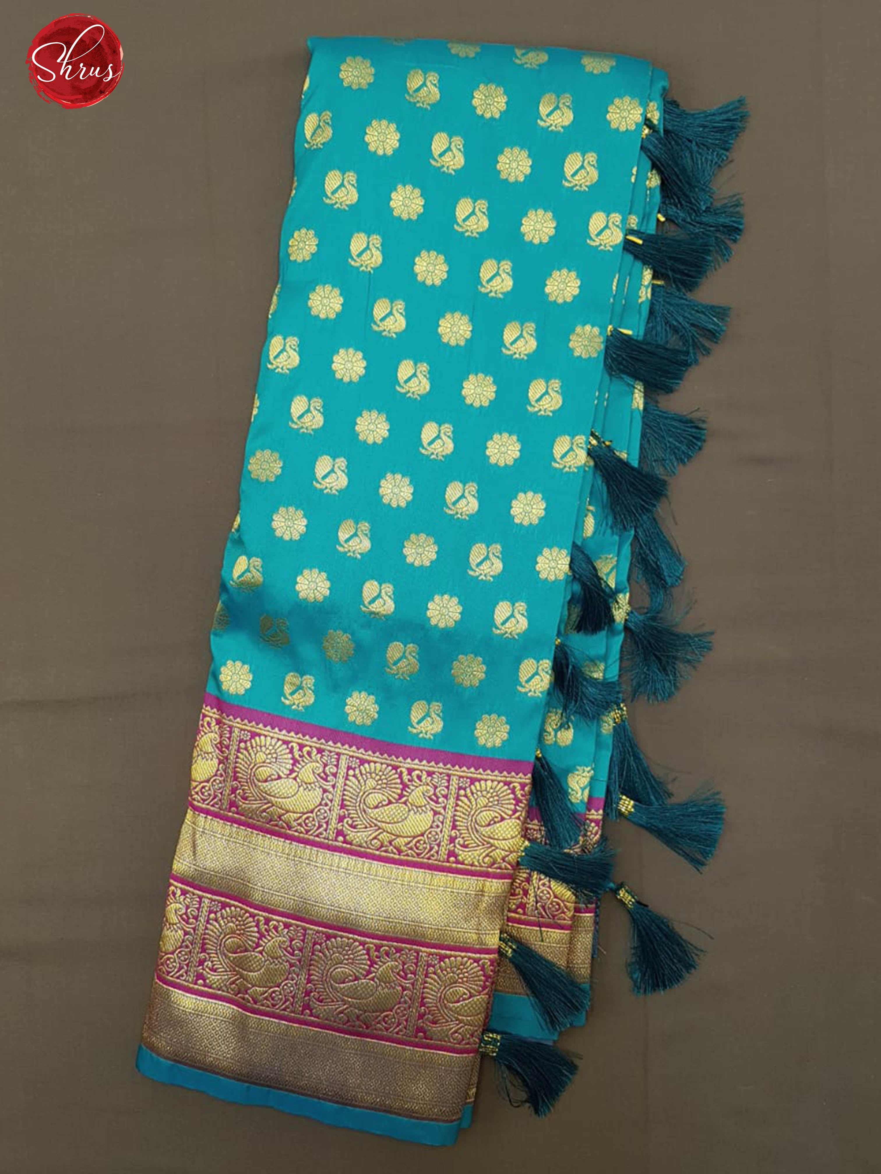 Blue & Purple -Semi Kanchipuram with Zari woven floral, peacock buttas on the body & Contrast Zari Border - Shop on ShrusEternity.com