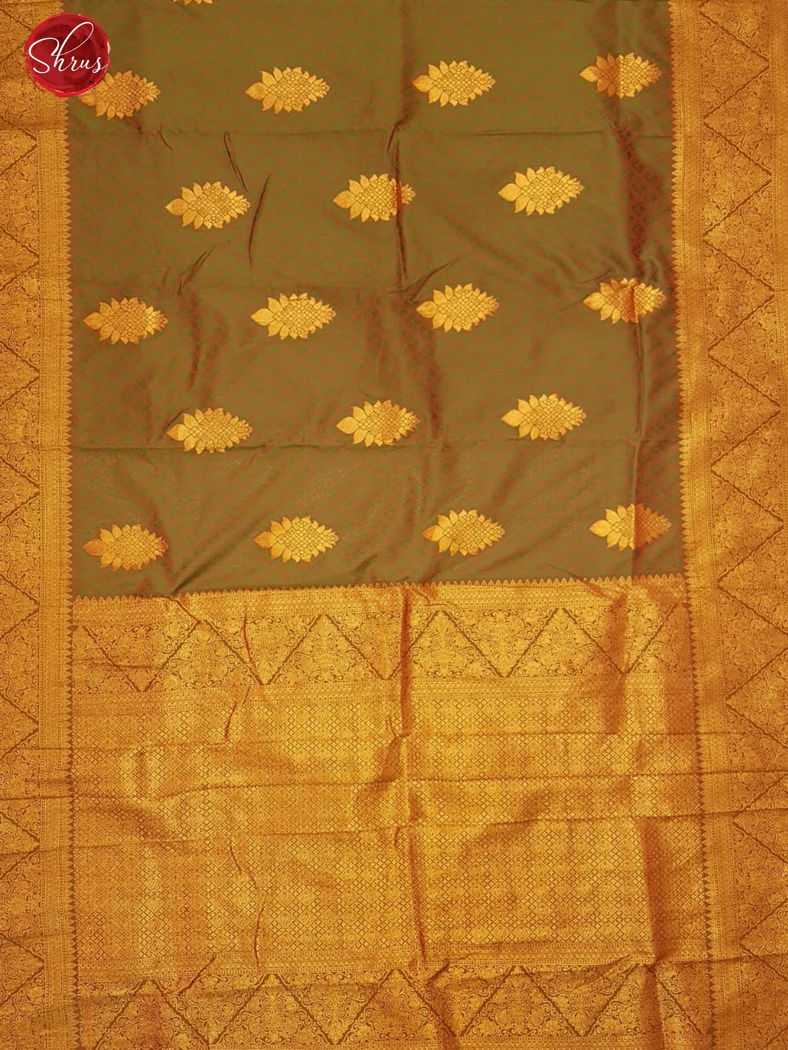 Green & Brown - Semi Kanchipuram with Zari woven floral motifs on the body & Contrast Zari Border - Shop on ShrusEternity.com