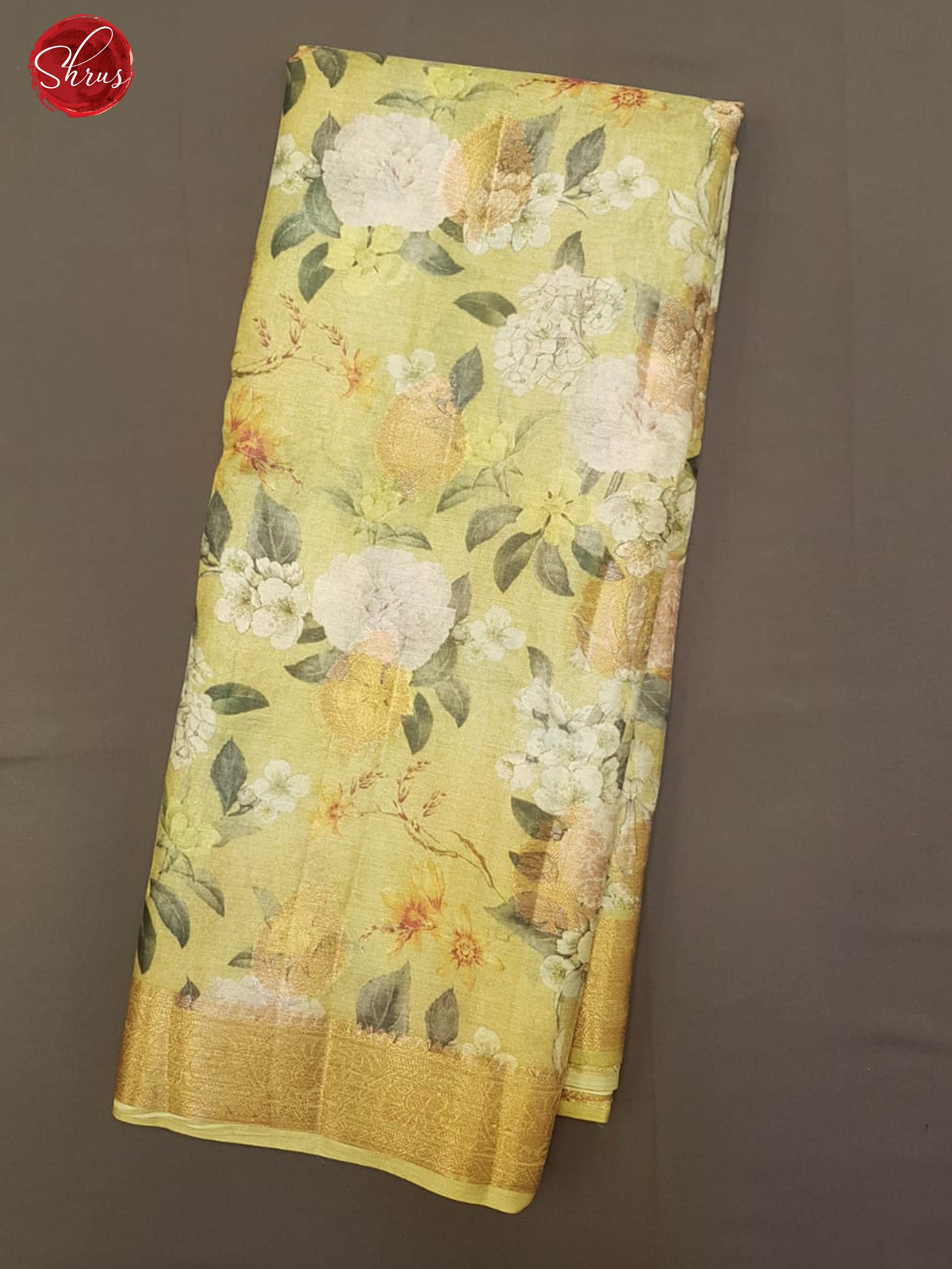 Green (Single Tone)- Tussar with zari woven floral motifs , floral print on the body & Zari Border