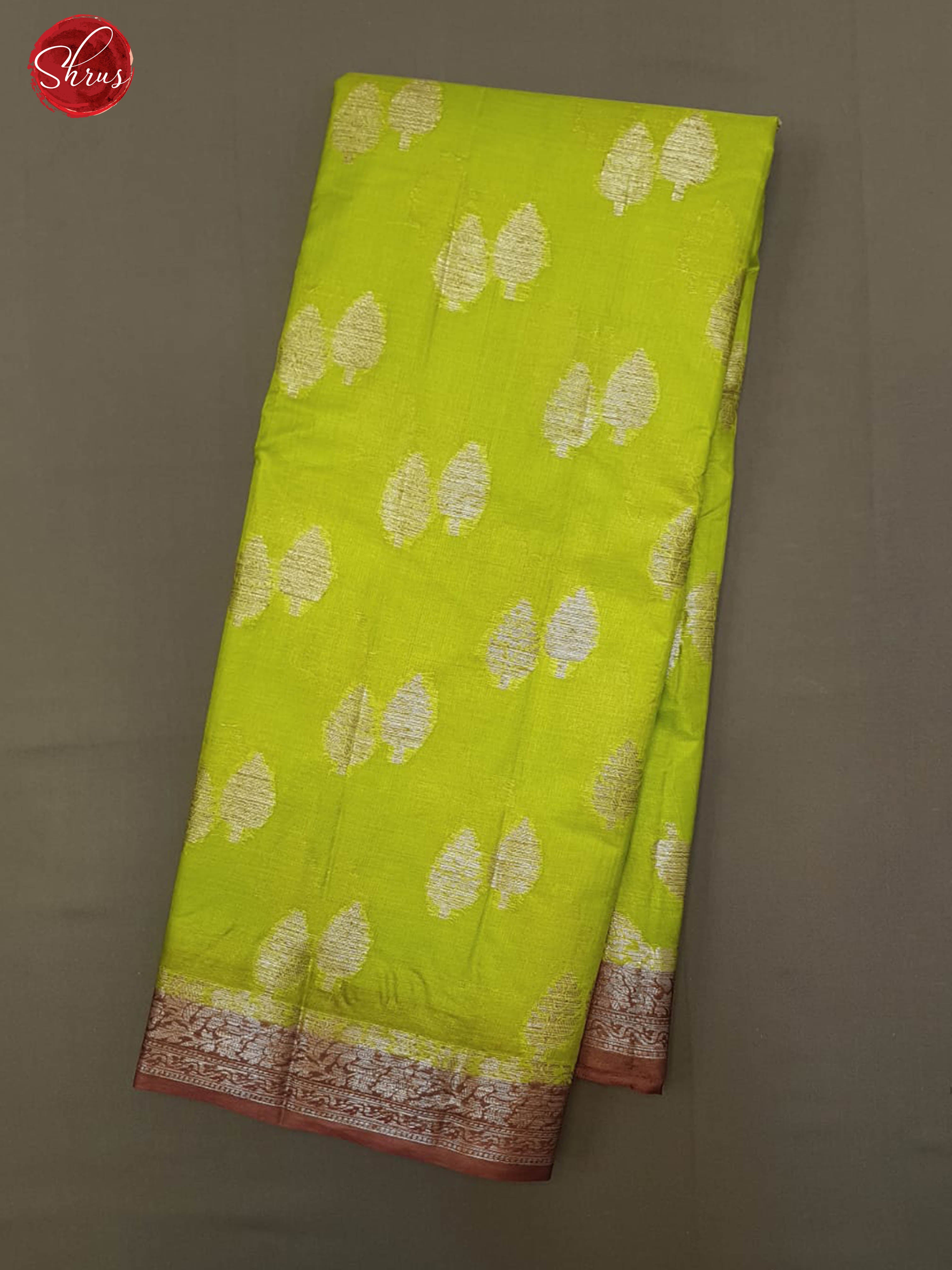 Green & maroon- Tussar with zari woven floral motifs on the body & contrast Zari Border - Shop on ShrusEternity.com