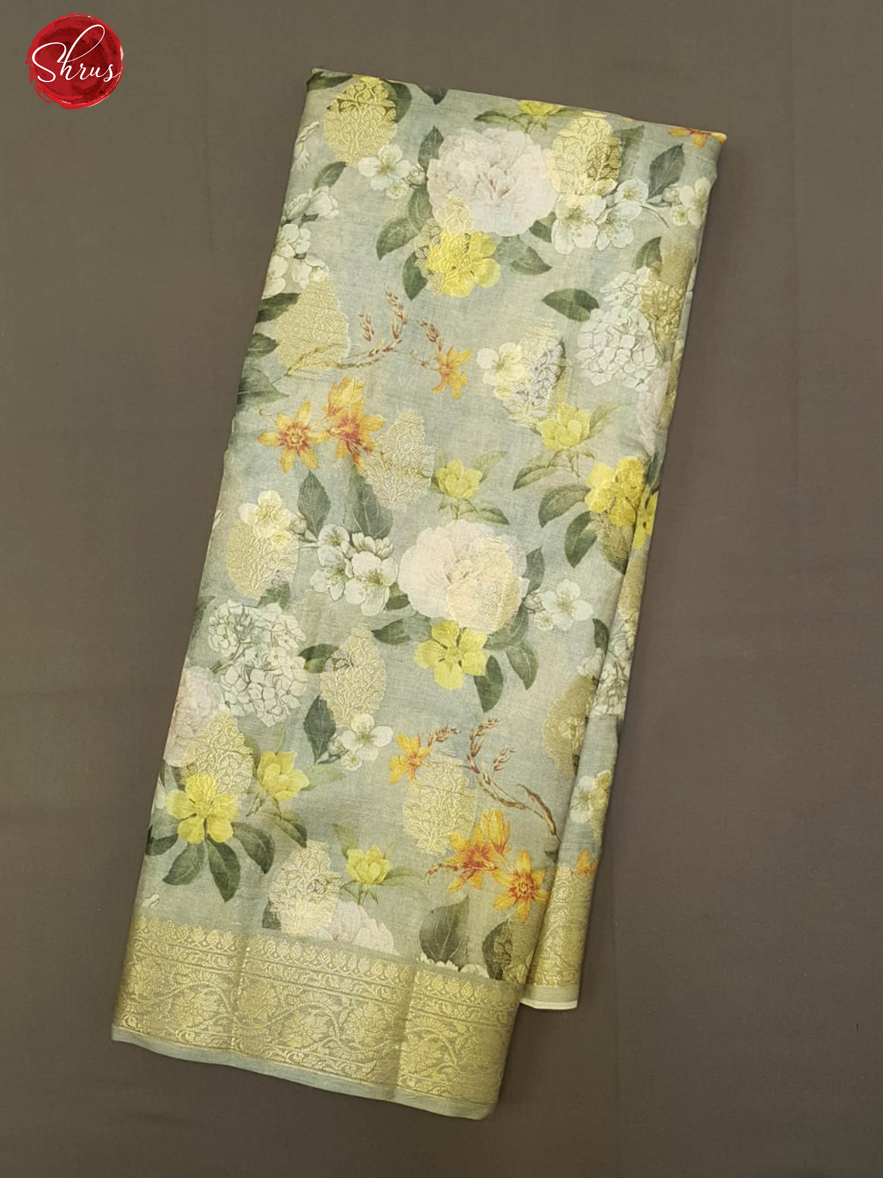 Grey & Green - Tussar with zari woven floral motifs , floral print on the body & Zari Border - Shop on ShrusEternity.com