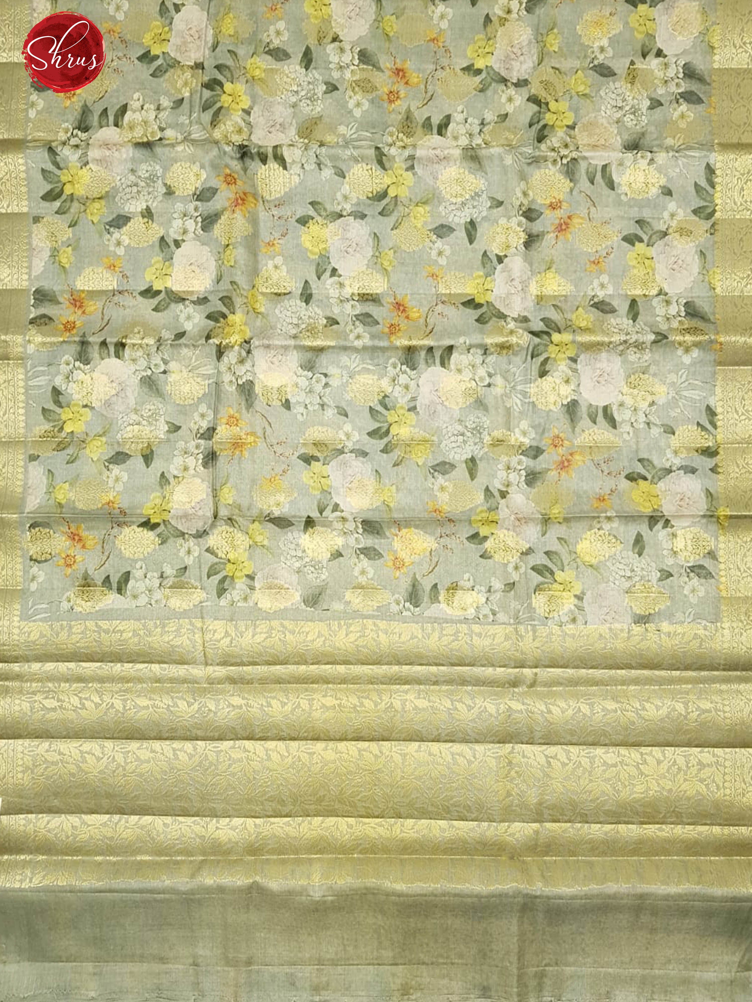 Grey & Green - Tussar with zari woven floral motifs , floral print on the body & Zari Border - Shop on ShrusEternity.com
