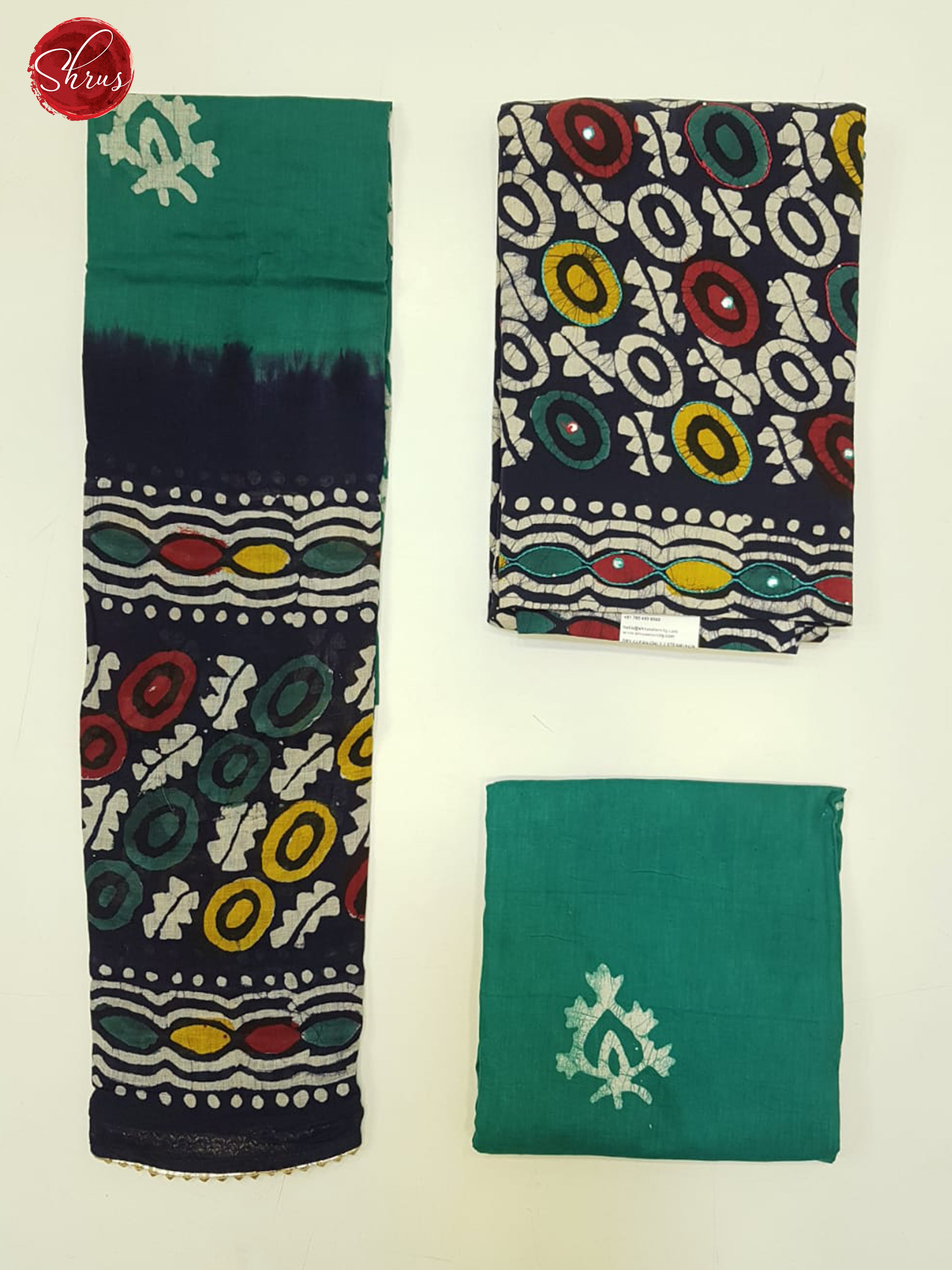 Blue & Green -Bhatik Suit with floral print , mirror embroidery on the top(In all suits the left part is the Dupatta , Top right pic is top and Bottom Right is the bottom) - Shop on ShrusEternity.com