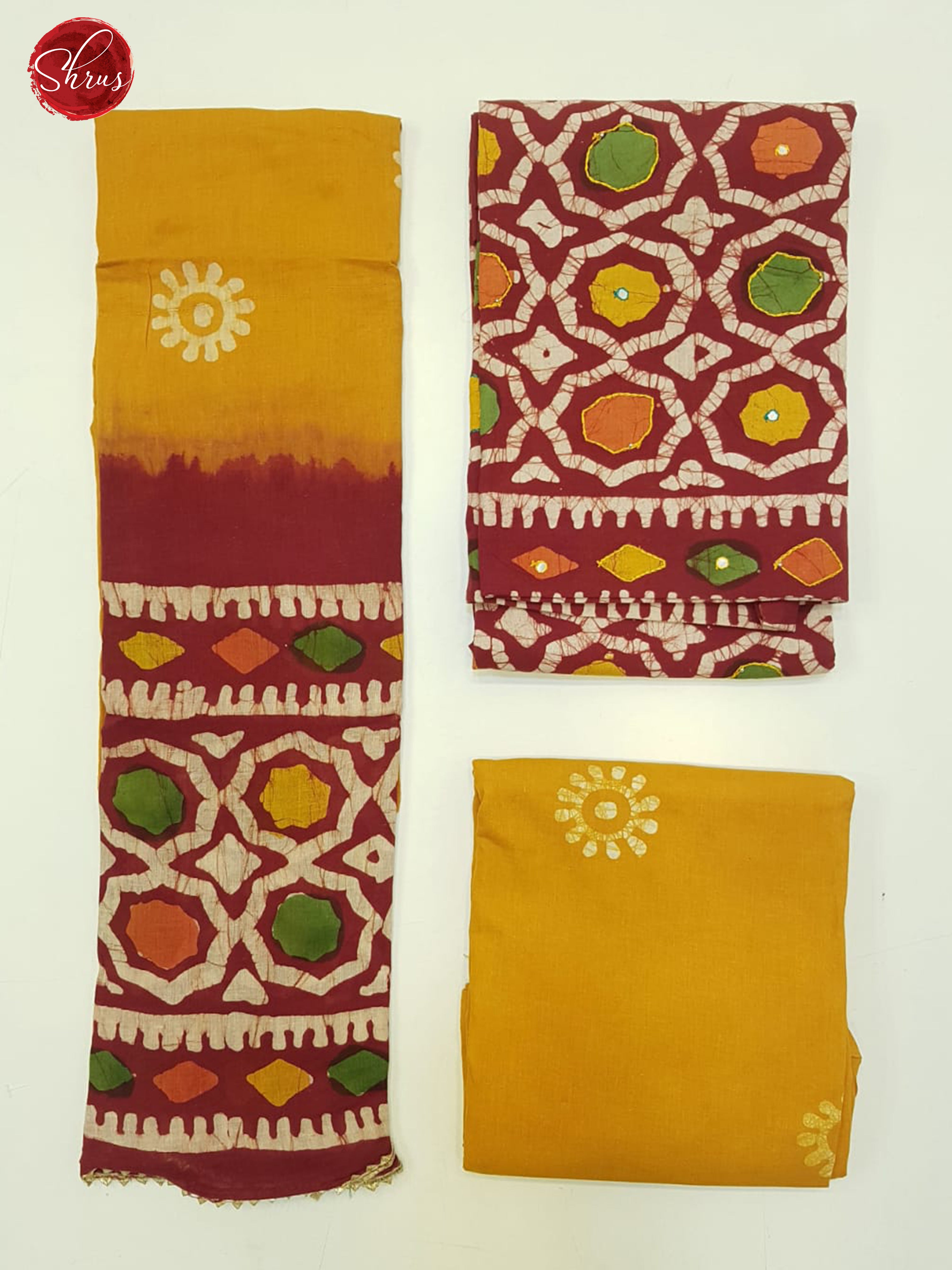 Red & Yellow - Bhatik Suit with floral print , mirror embroidery on the top(In all suits the left part is the Dupatta , Top right pic is top and Bottom Right is the bottom) - Shop on ShrusEternity.com