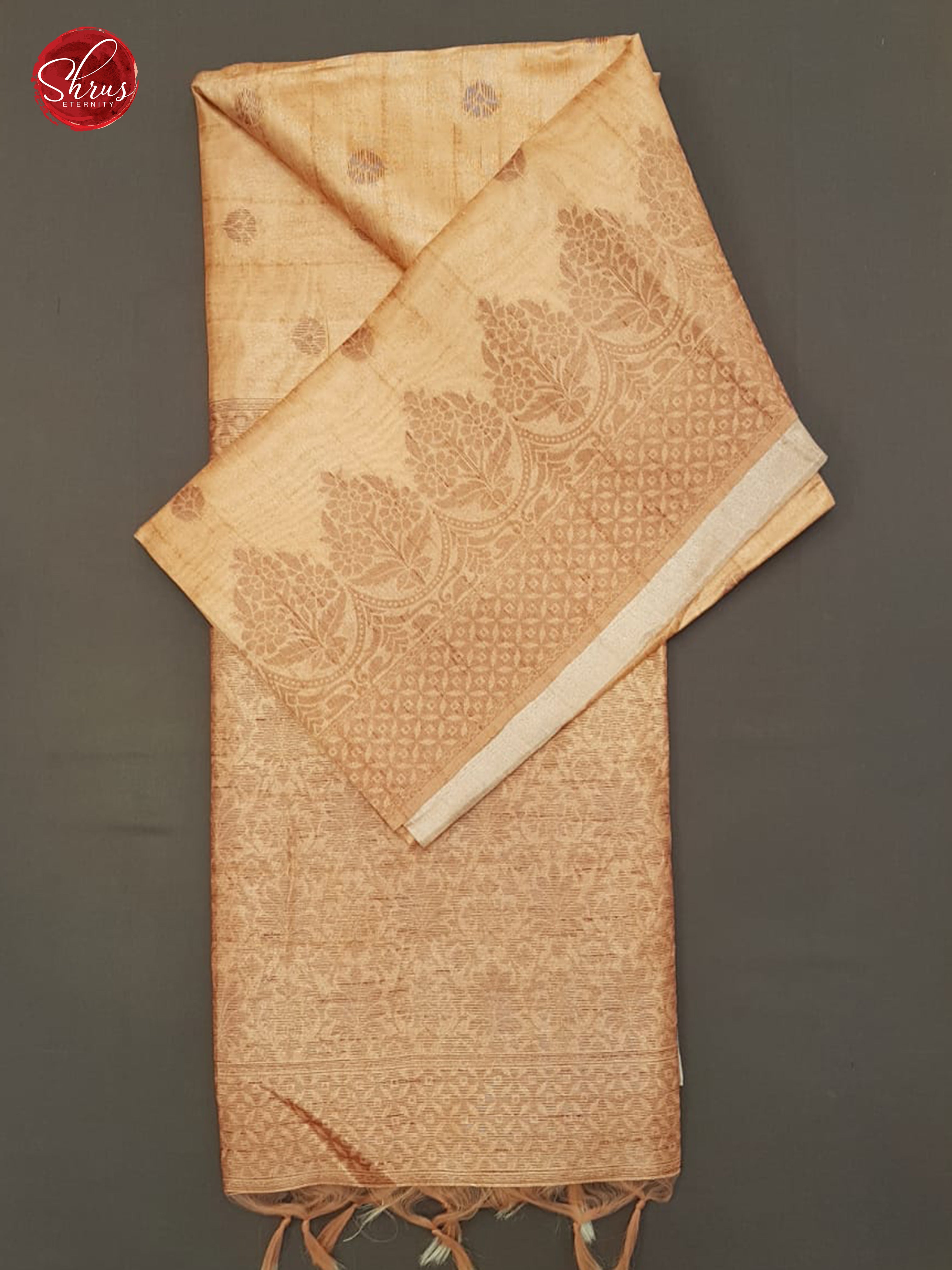 Peach(Single Tone)- Semi Tussar with Zari buttas on the body & zari Border - Shop on ShrusEternity.com