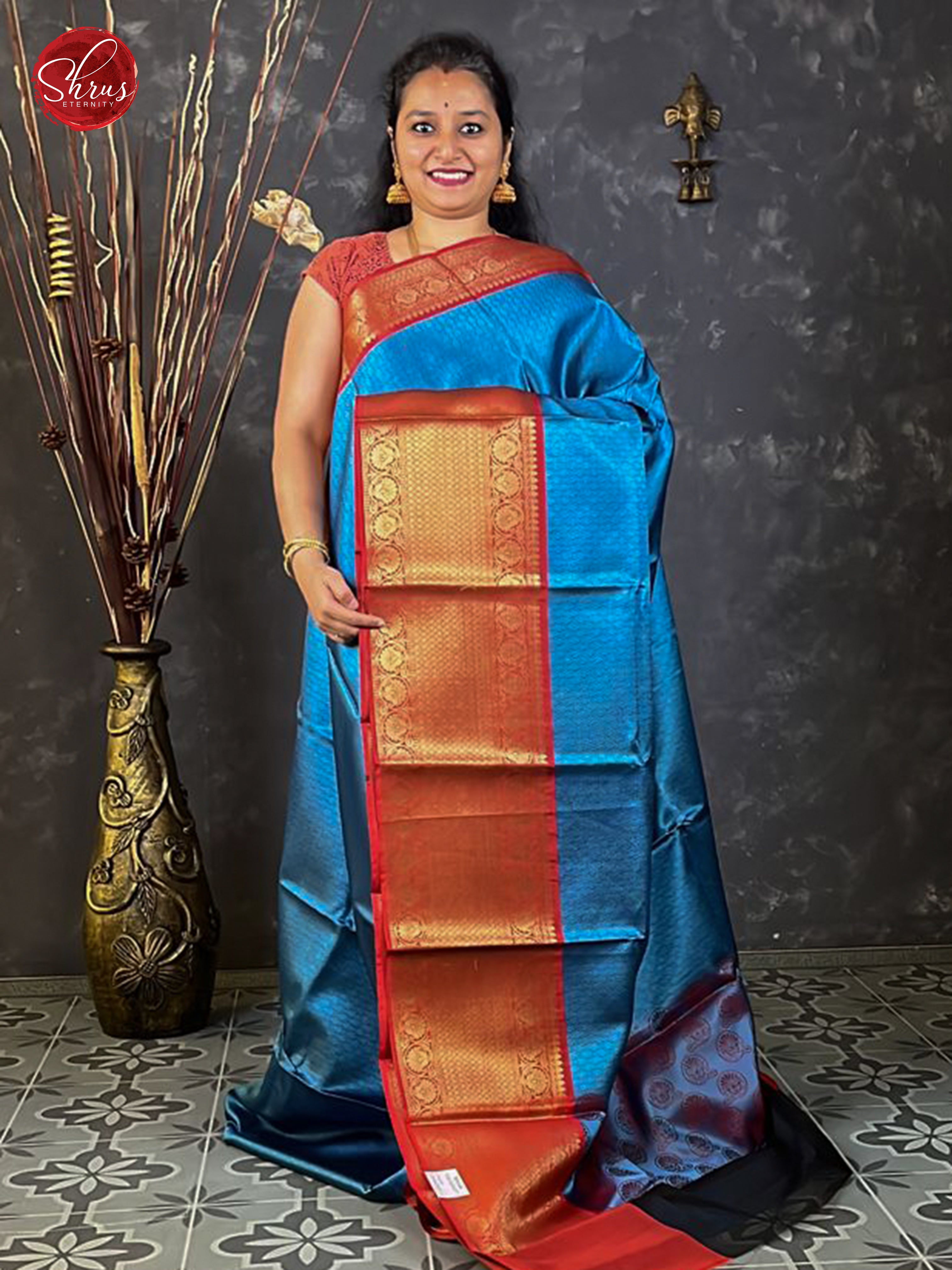 Blue & Red - Tanchoi Semi Silk with floral jacquard on the body & Contrast Zari Border - Shop on ShrusEternity.com