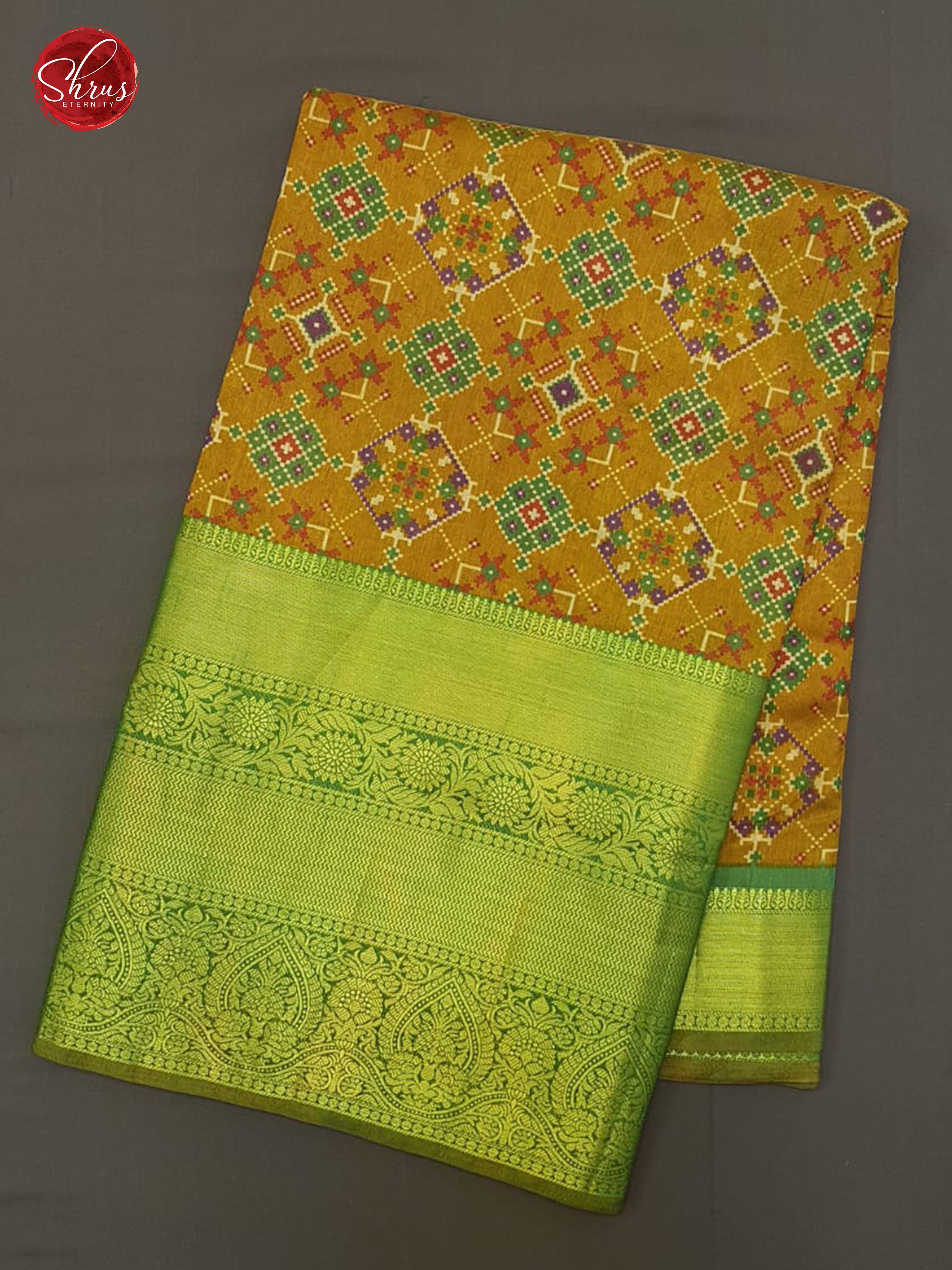 Mustard & Green - Semi Patola with patola floral print on the body & contrast zari border - Shop on ShrusEternity.com