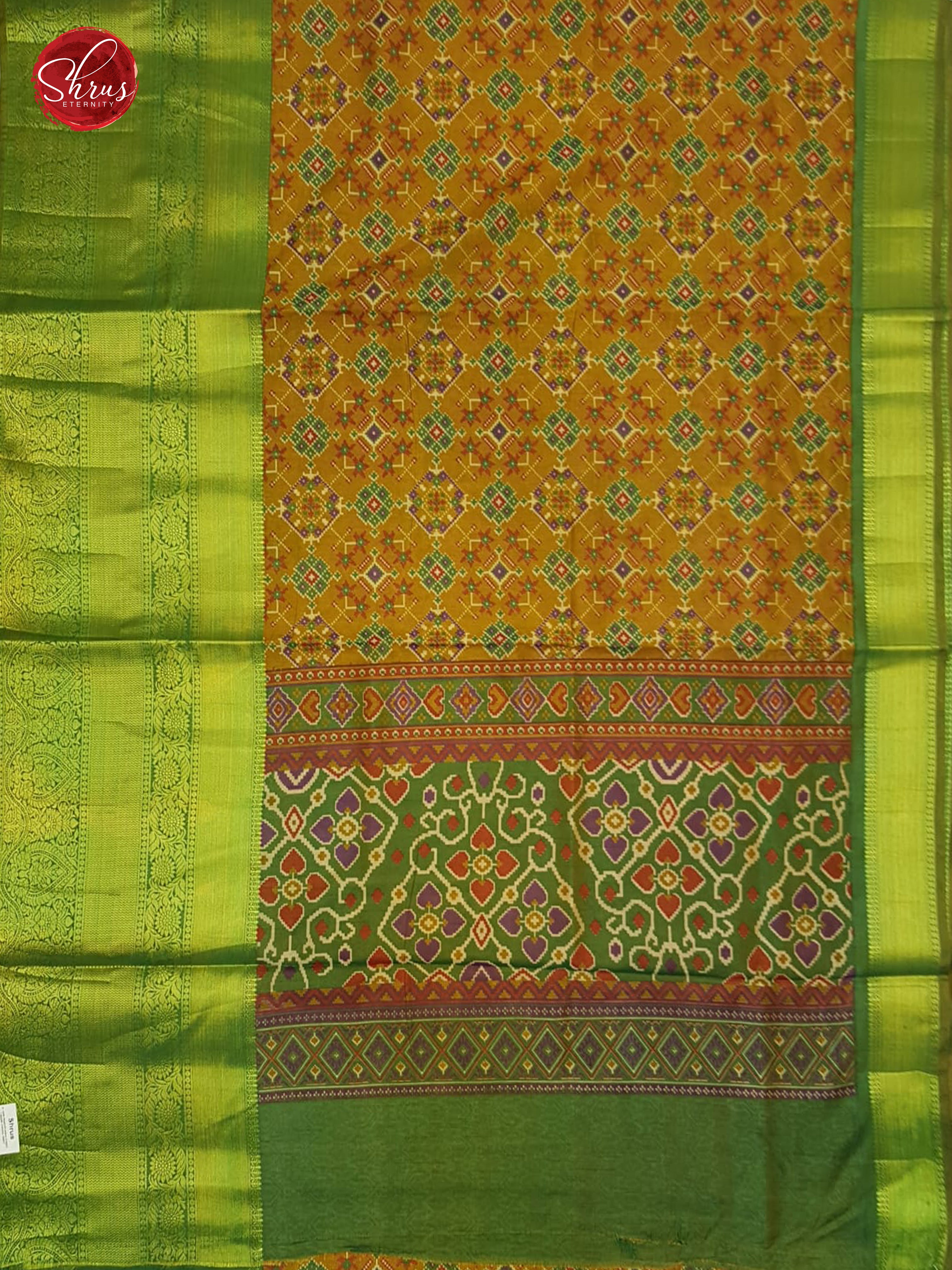 Mustard & Green - Semi Patola with patola floral print on the body & contrast zari border - Shop on ShrusEternity.com