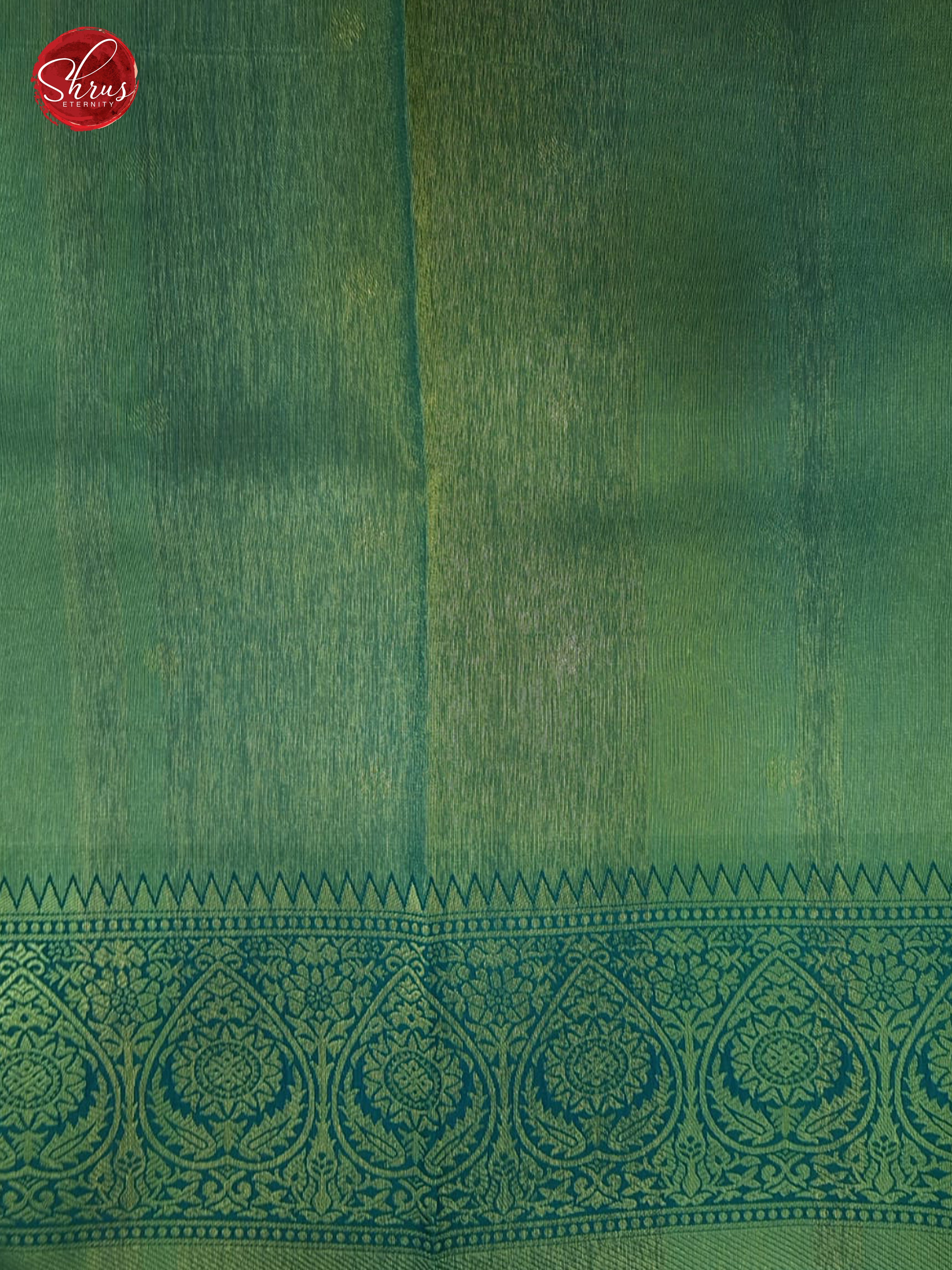 Orange & Green- Semi Kanchipuram with floral print on the body & Zari Border - Shop on ShrusEternity.com