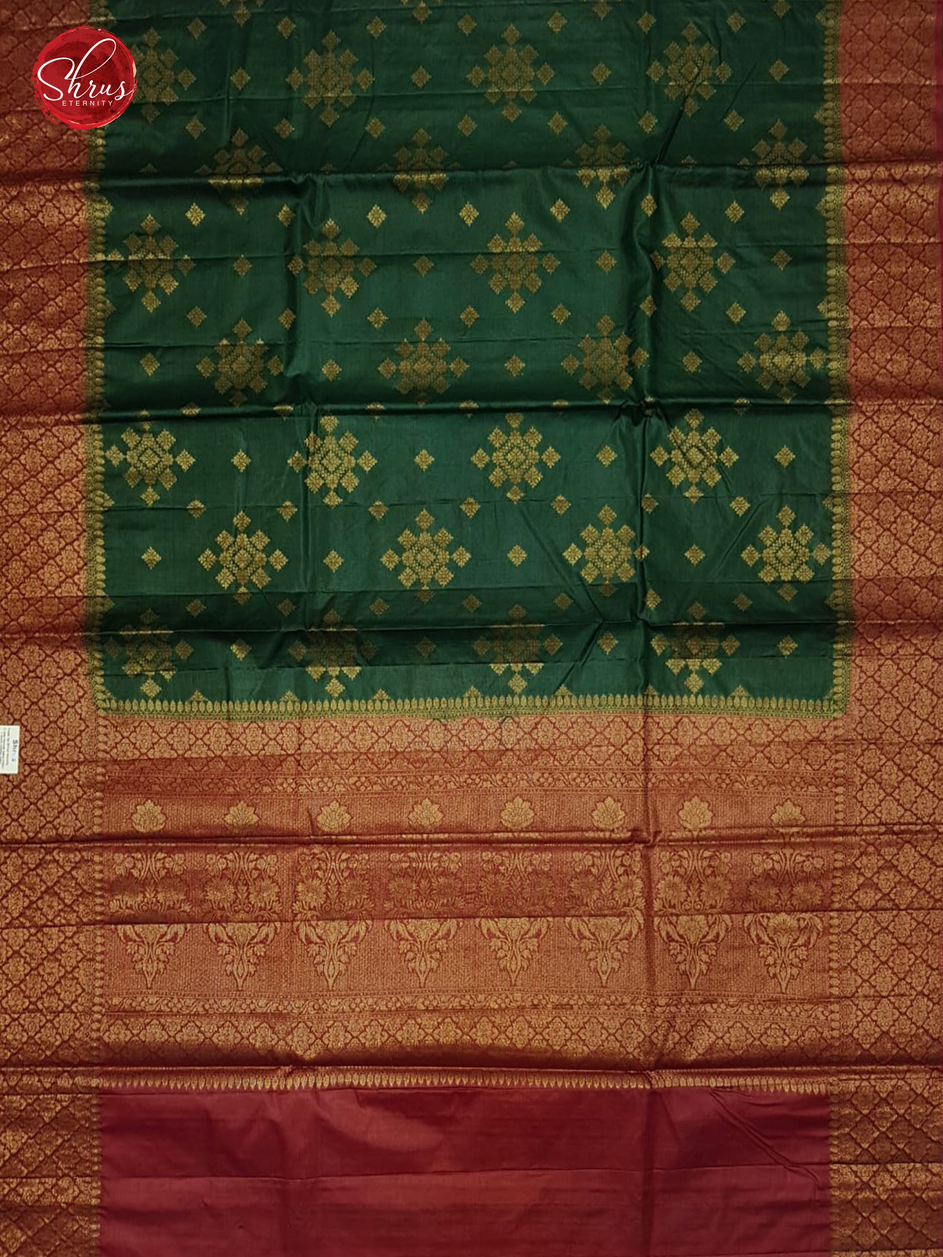 Green & Red - Tussar with zari woven floral motifs on the body & Zari Border - Shop on ShrusEternity.com