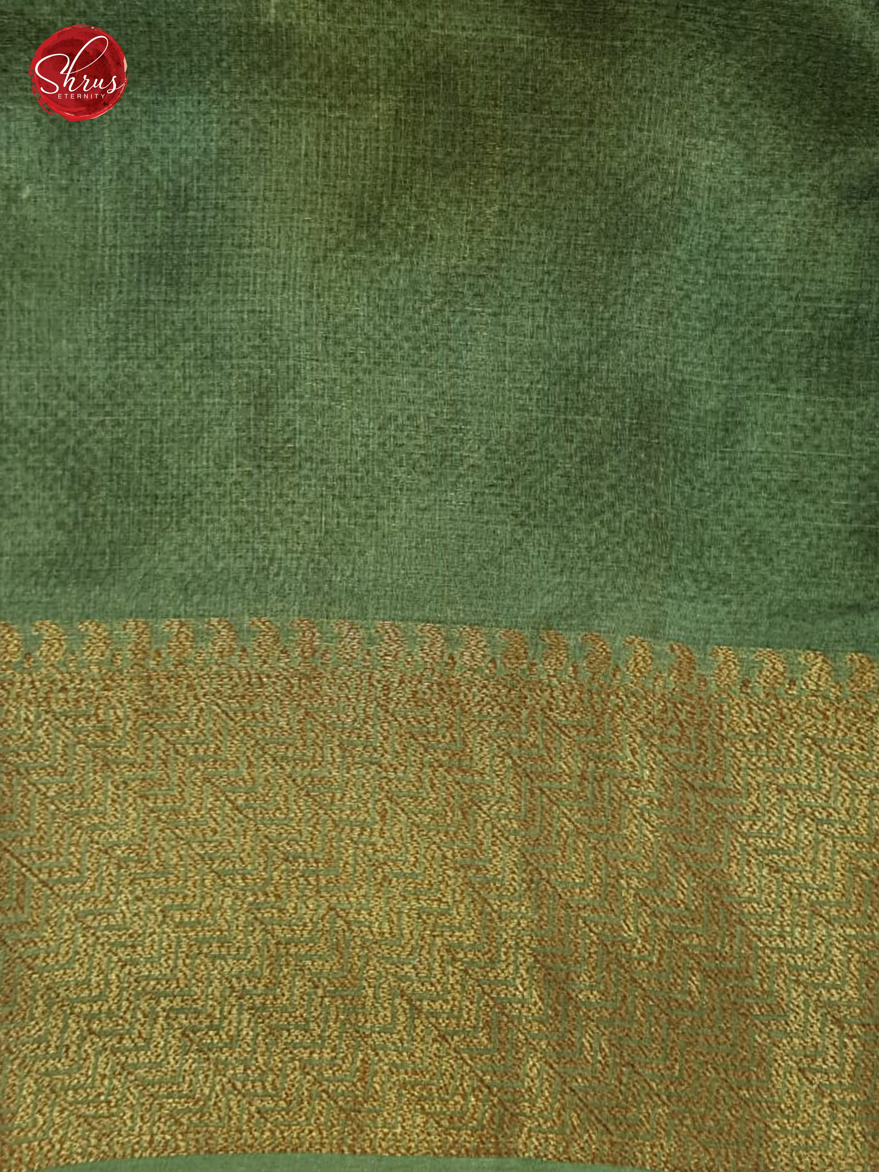 Green(Single Tone)- Tussar with zari woven floral motifs , floral print on the body & Zari Border - Shop on ShrusEternity.com