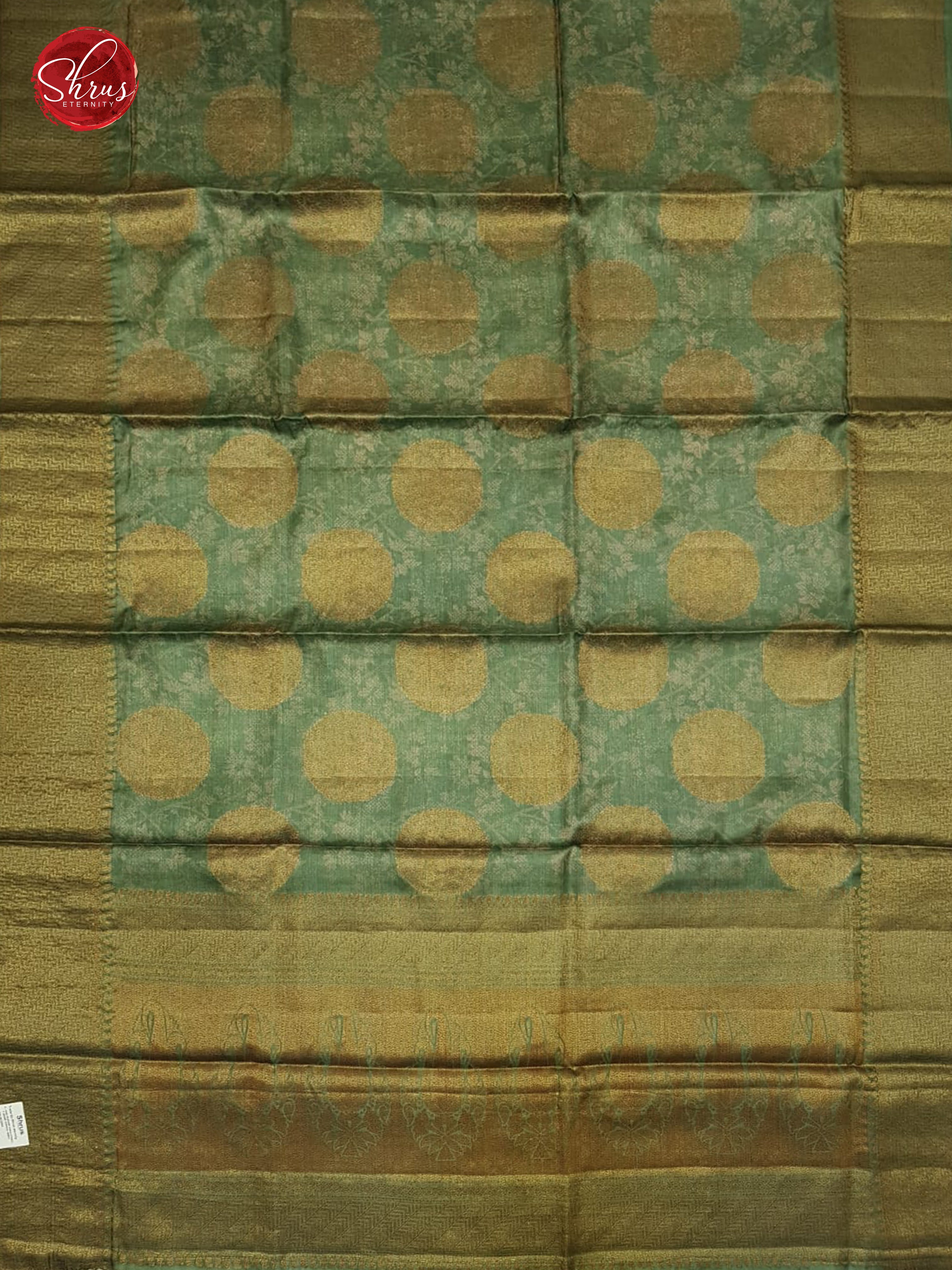 Green(Single Tone)- Tussar with zari woven floral motifs , floral print on the body & Zari Border - Shop on ShrusEternity.com
